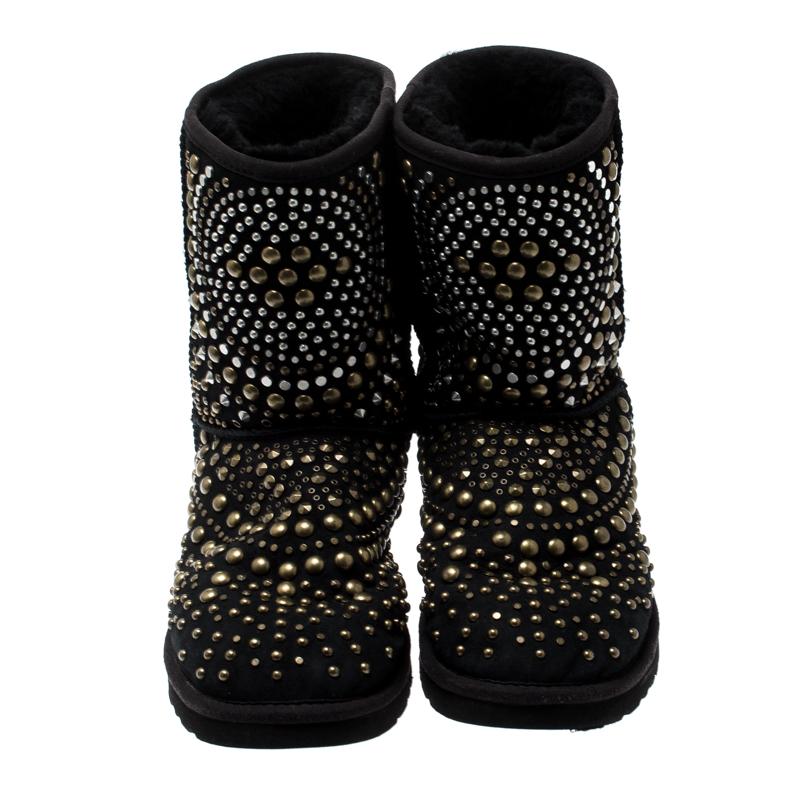 These black Mandah boots are from the Jimmy Choo x Uggs collaborative line. They are probably the comfiest thing one can have. Made from suede, the boots feature gold-tone studs on the exterior and fur as the lining.

Includes: The Luxury Closet