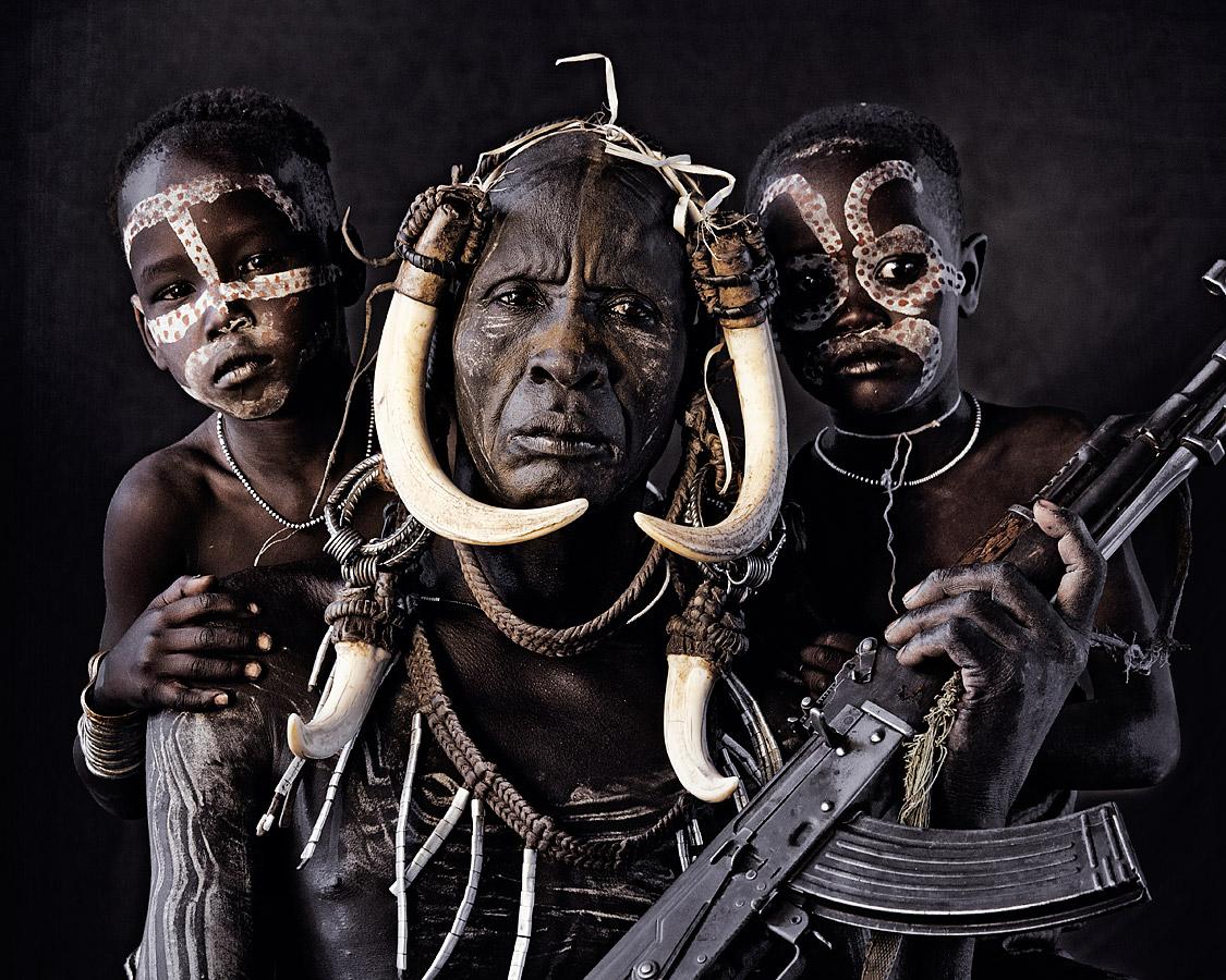 "XI 262 - Hilao Moyizo Village - Omo Valley - Ethiopia, 2011

The nomadic Mursi people live in the lower area of Africa’s Great Rift Valley. Extreme drought has made it difficult for them to feed themselves by means of traditional cultivation and
