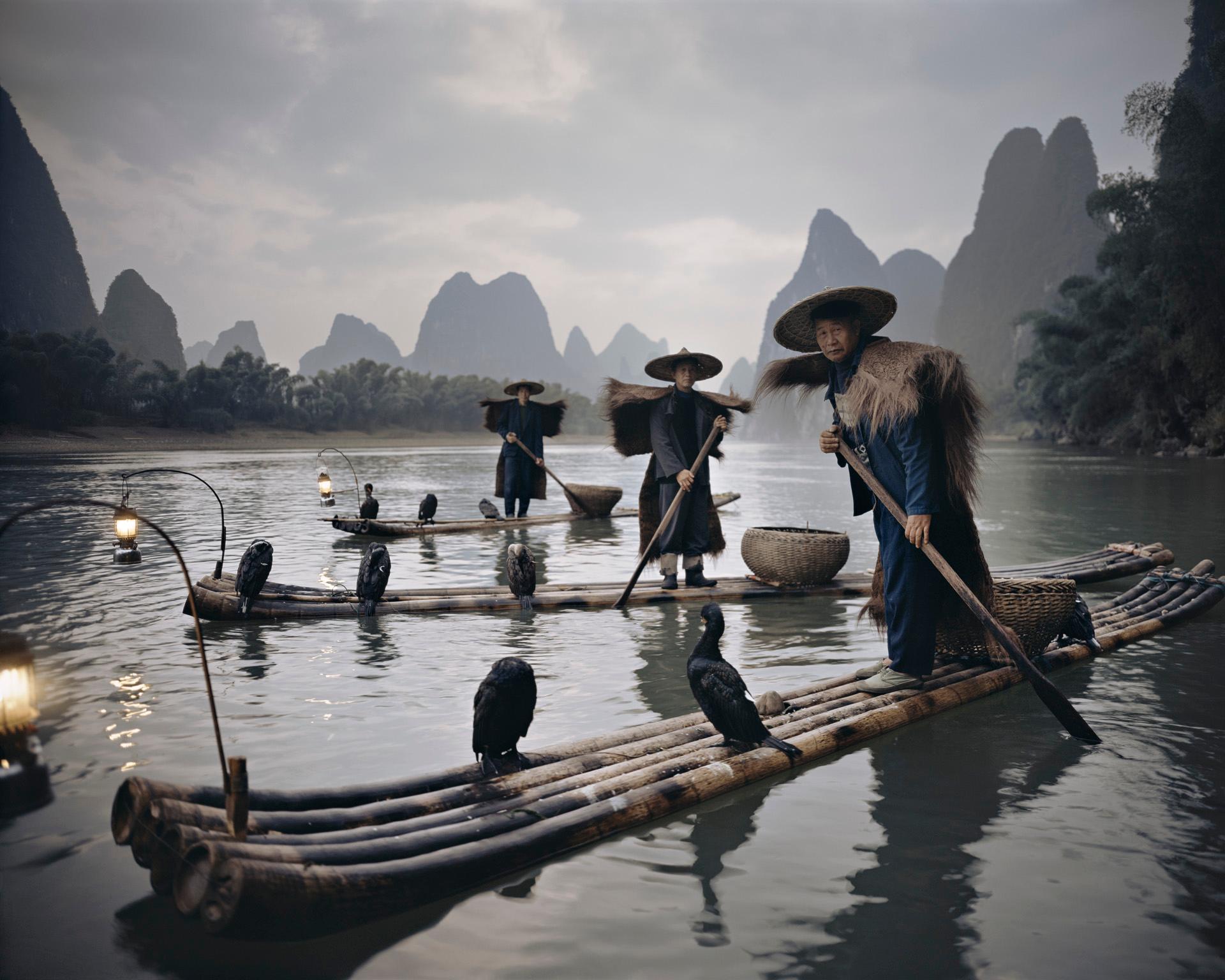 "XXII467 Yangshuo Cormorants

Yangshuo County is a county under the jurisdiction of Guilin City, in the northeast of Guangxi, China. Its seat is located in Yangshuo Town. Surrounded by karst peaks and bordered on one side by the Li River it is