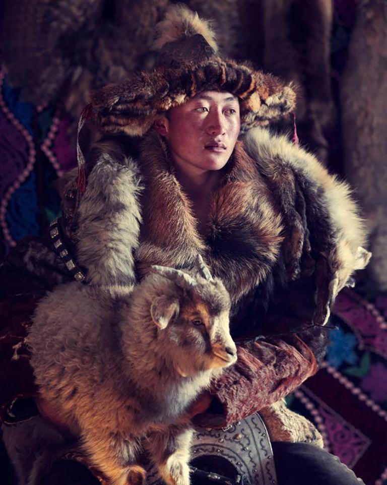 "XXX 15
Esker Eagle hunter
Sagsai, Bayan Ulgii Province, 
Mongolia

The Mongolian Kazakhs travelled through Russia to the Mongolian Altai Mountains living as semi-nomads, moving several times a year according to the season. The diaspora is by no