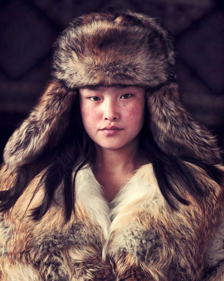 "XXX 5
Meruert
Sagsai, Bayan Ulgii Province, 
Mongolia

The Mongolian Kazakhs travelled through Russia to the Mongolian Altai Mountains living as semi-nomads, moving several times a year according to the season. The diaspora is by no means a