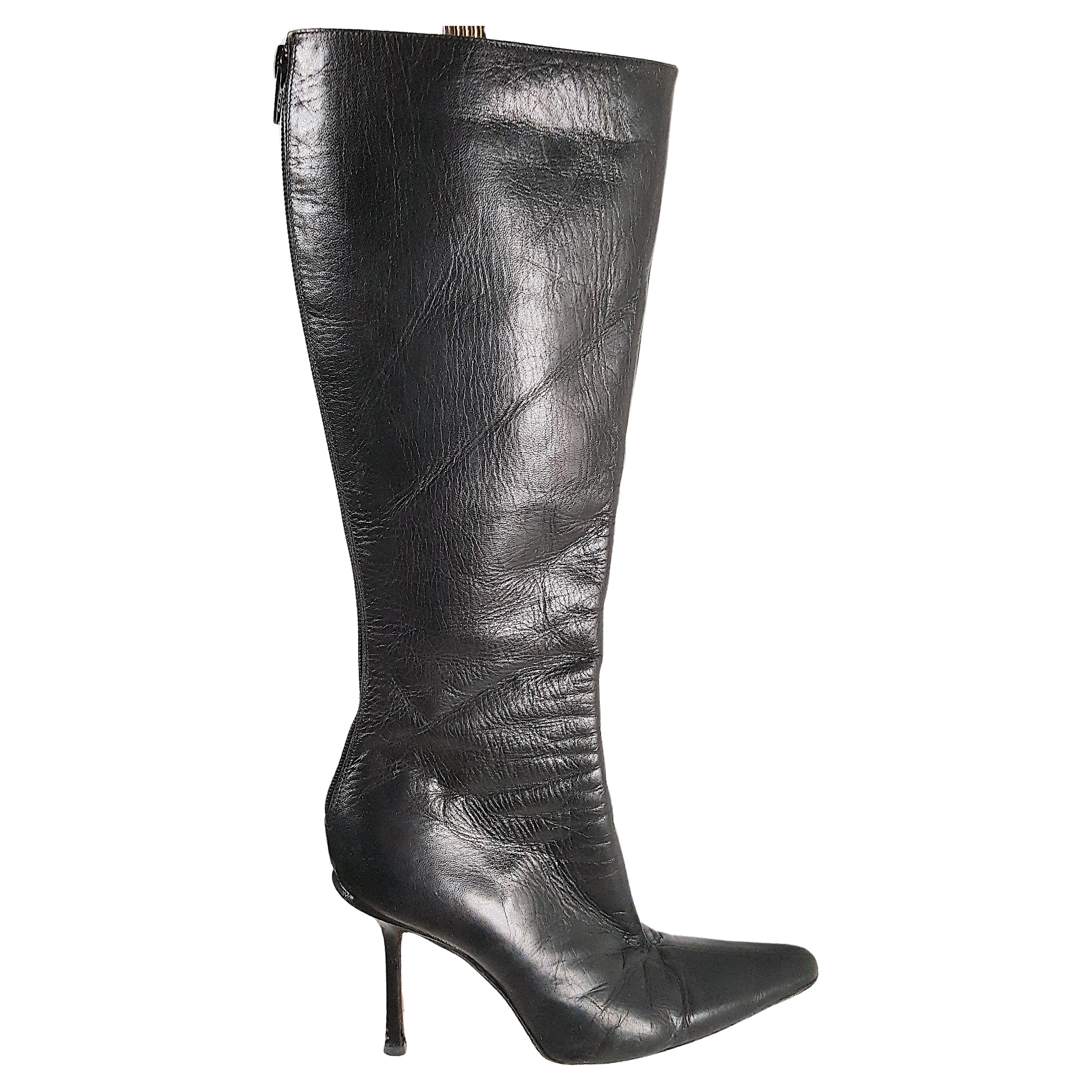 These Jimmy Choo tall stiletto pointed-toe black smooth calf-leather dress boots with an invisible zip in back were among the most coveted of his finely crafted 