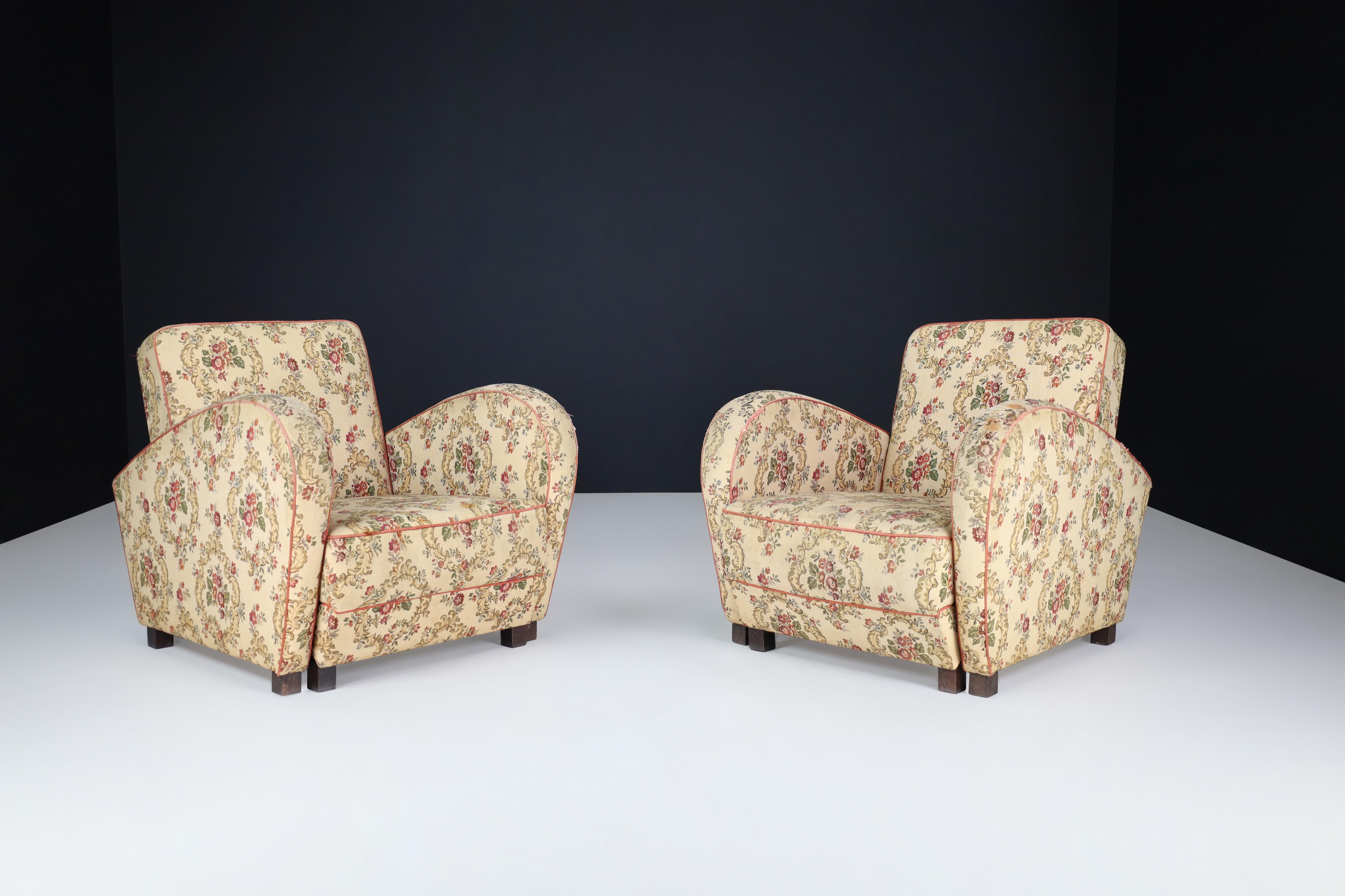 Jindrich Halabala Art Deco Lounge Chairs in Floral Upholstery.

This rare set of Art Deco lounge chairs/daybeds was designed by Jindrich Halabala, a Czech designer, in the 1930s. They are a testament to midcentury design in Central Europe,