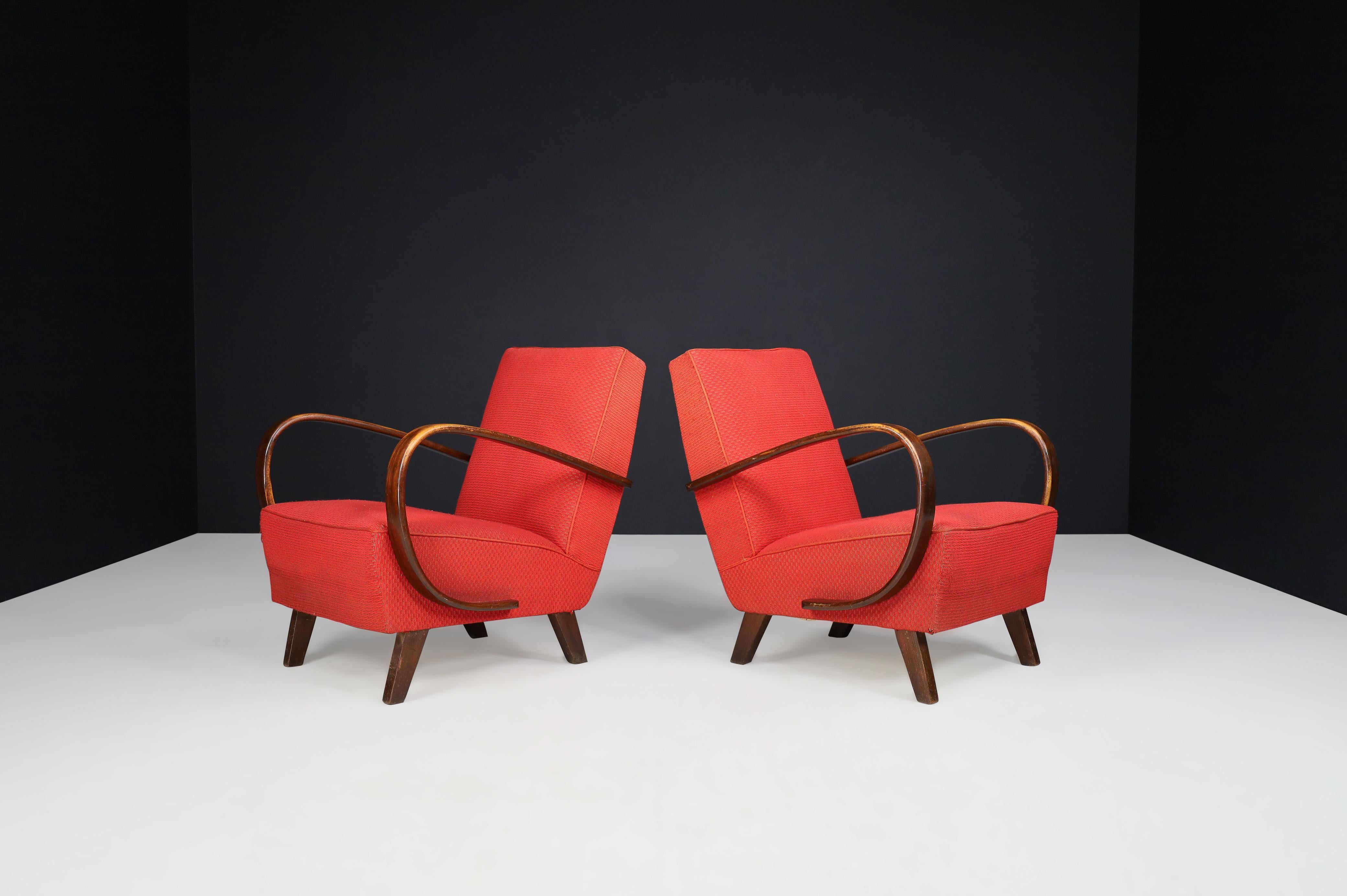 Jindrich Halabala bentwood armchairs with original upholstery, 1940s Czech Republic. 

Jindrich Halabala bentwood armchairs with original upholstery, 1940s Czech Republic. These iconic set chairs are from Czechia, circa 1940. They are produced by