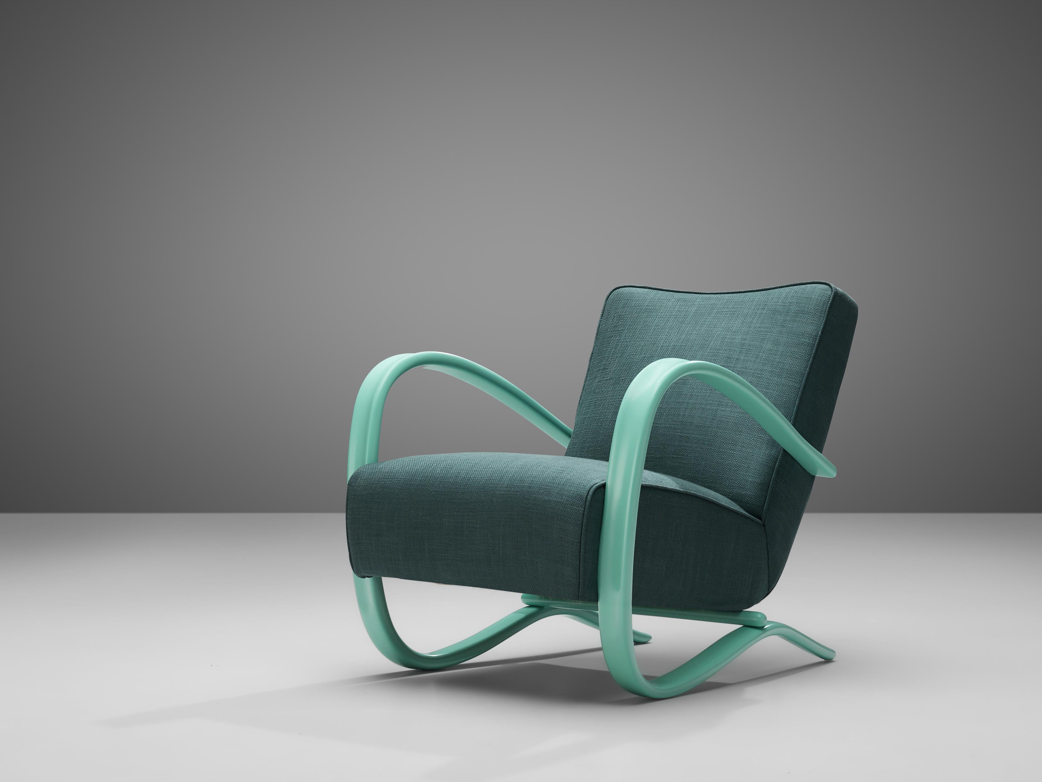 Jindrich Halabala, personalisierbarer Sessel, Holz, Stoff, Tschechische Republik, 1930er Jahre

Außergewöhnlicher Sessel mit grüner Stoffbespannung. Dieser Stuhl hat ein sehr dynamisches und üppiges Aussehen. Wunderschön geschwungene Armlehnen in