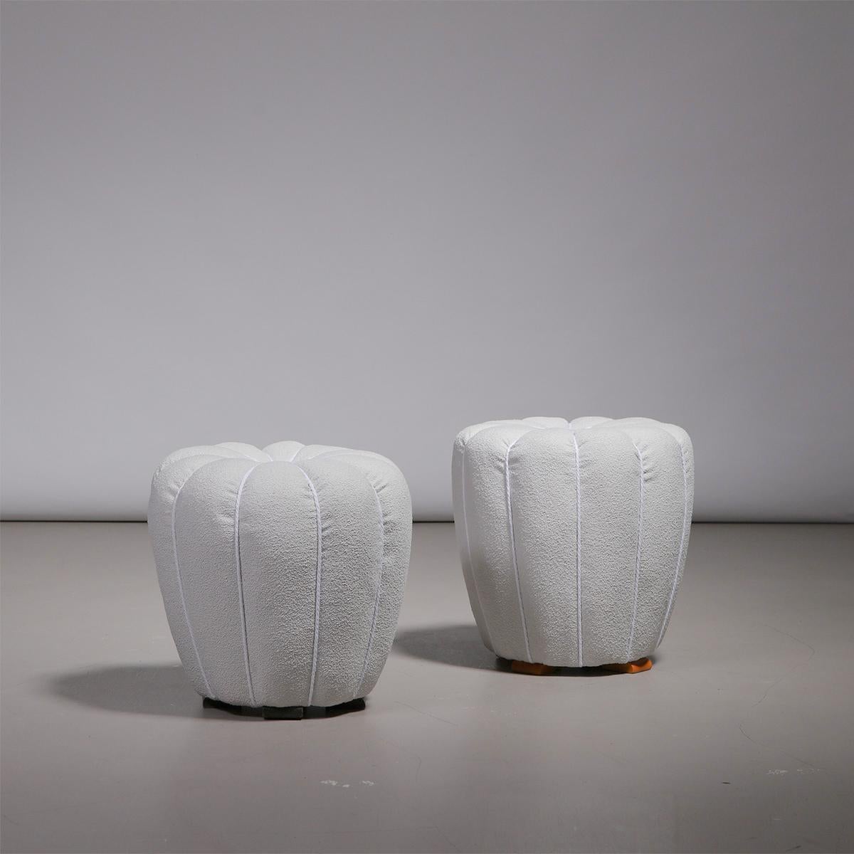 Pair of Art Deco stools or ottomans in light fabric and wood designed by Jindřich Halabala and manufactured by UP závody in the former Czechoslovakia, 1930s.

These elegant Art Deco stools were designed by Jindřich Halabala and manufactured by UP