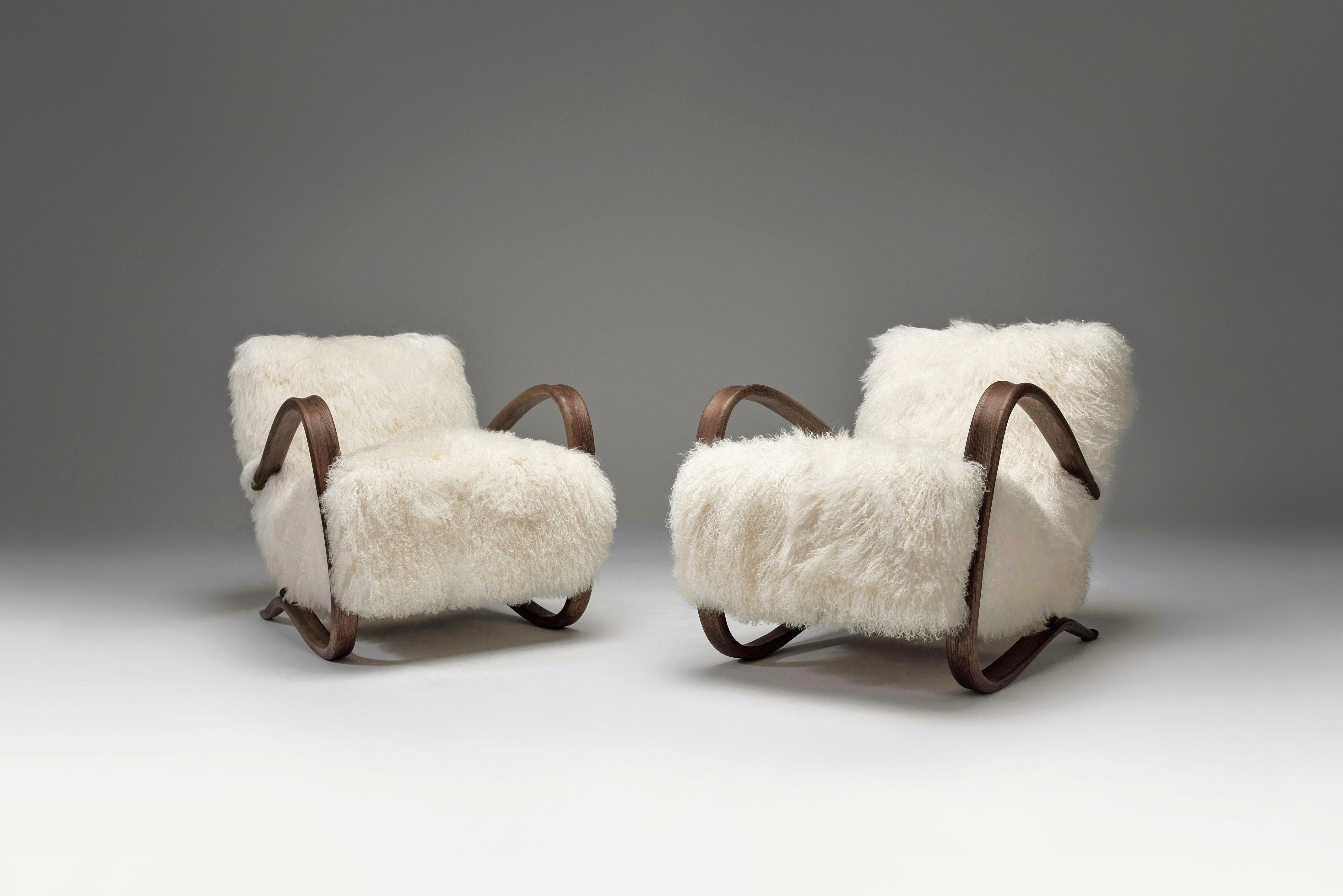 ndrich Halabala lounge chairs model “H-269”, Czech Republic, 1930s.

Amazing armchairs upholstered in white Tibetan lambswool with curly hair.

These chairs have a dynamic and generous appearance, together with beautiful, fuzzy upholstery add a