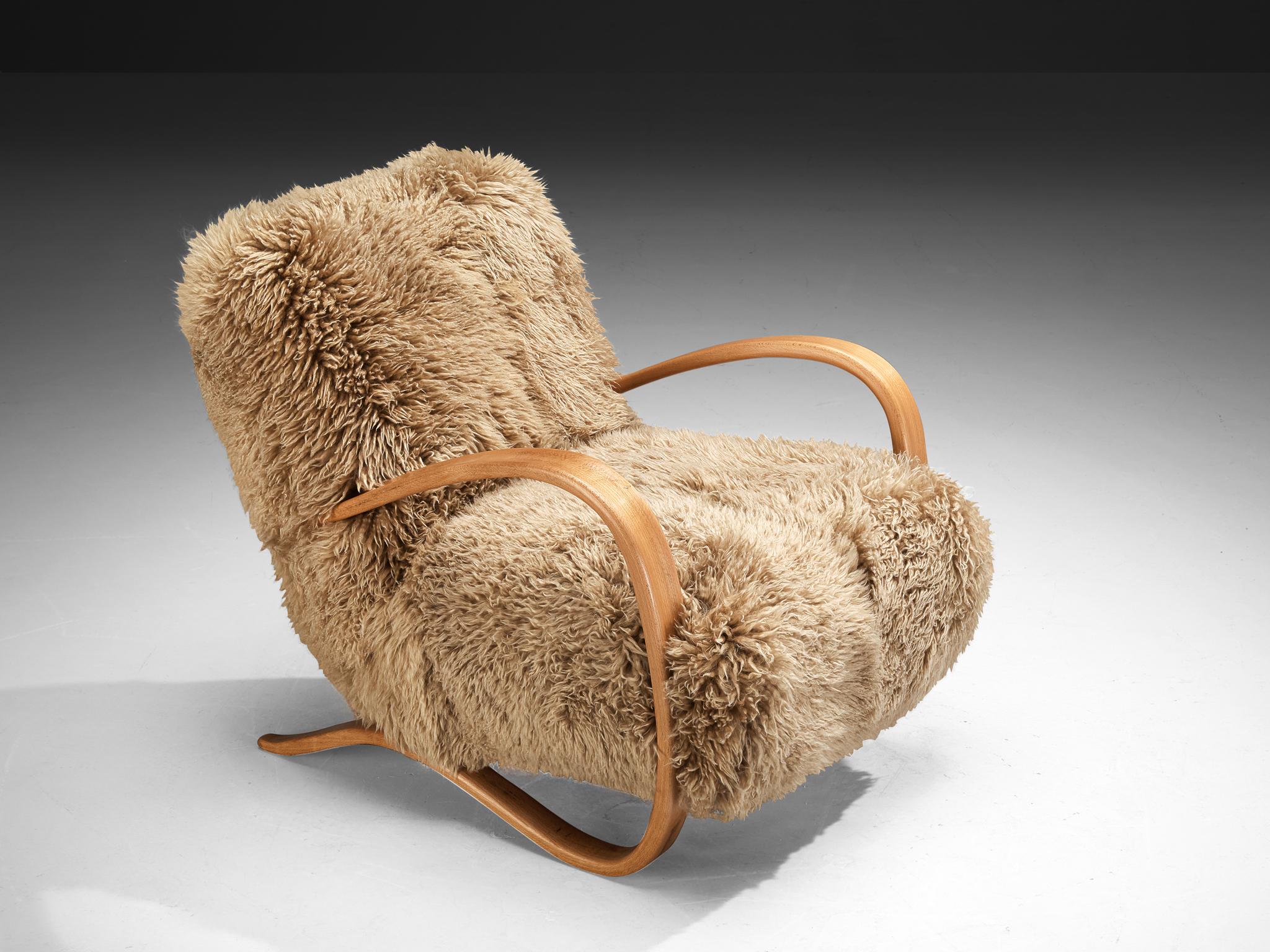 Mid-20th Century Jindrich Halabala Lounge Chair in Beige Sheepskin For Sale