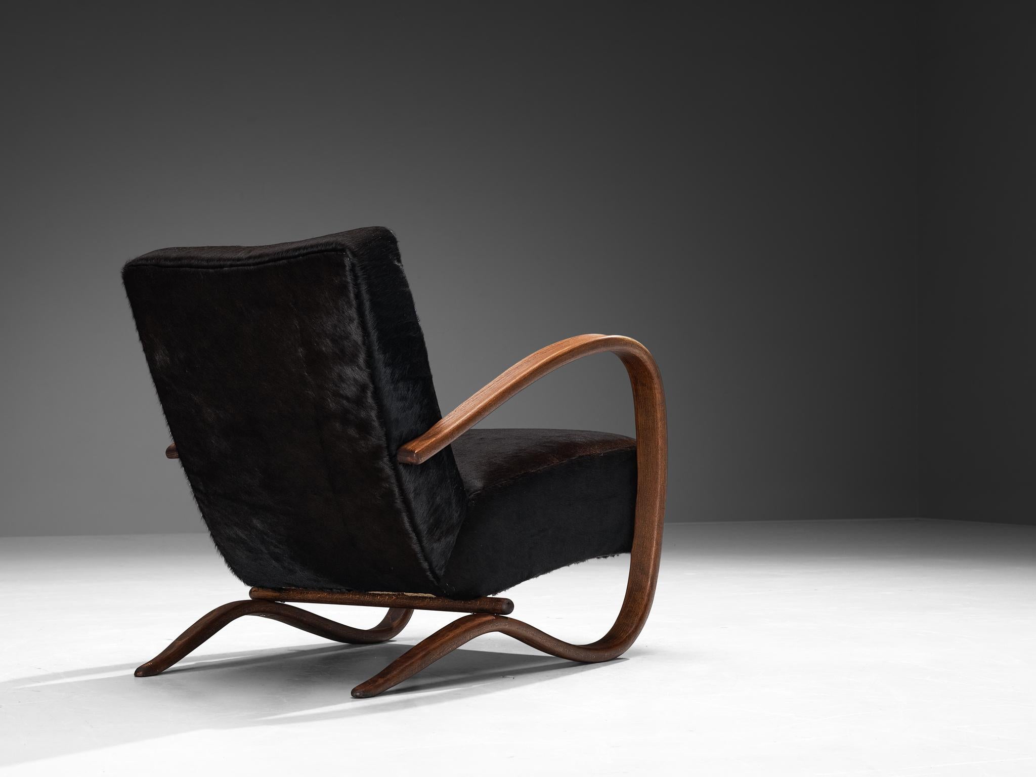 Mid-20th Century Jindřich Halabala Lounge Chair in Burgundy Cowhide For Sale