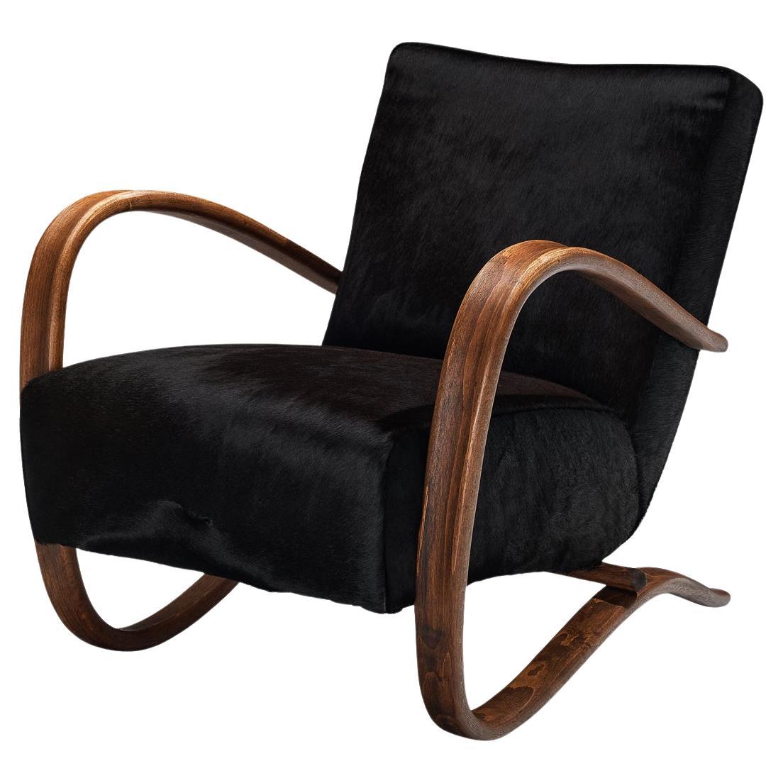 Jindřich Halabala Lounge Chair in Burgundy Cowhide For Sale