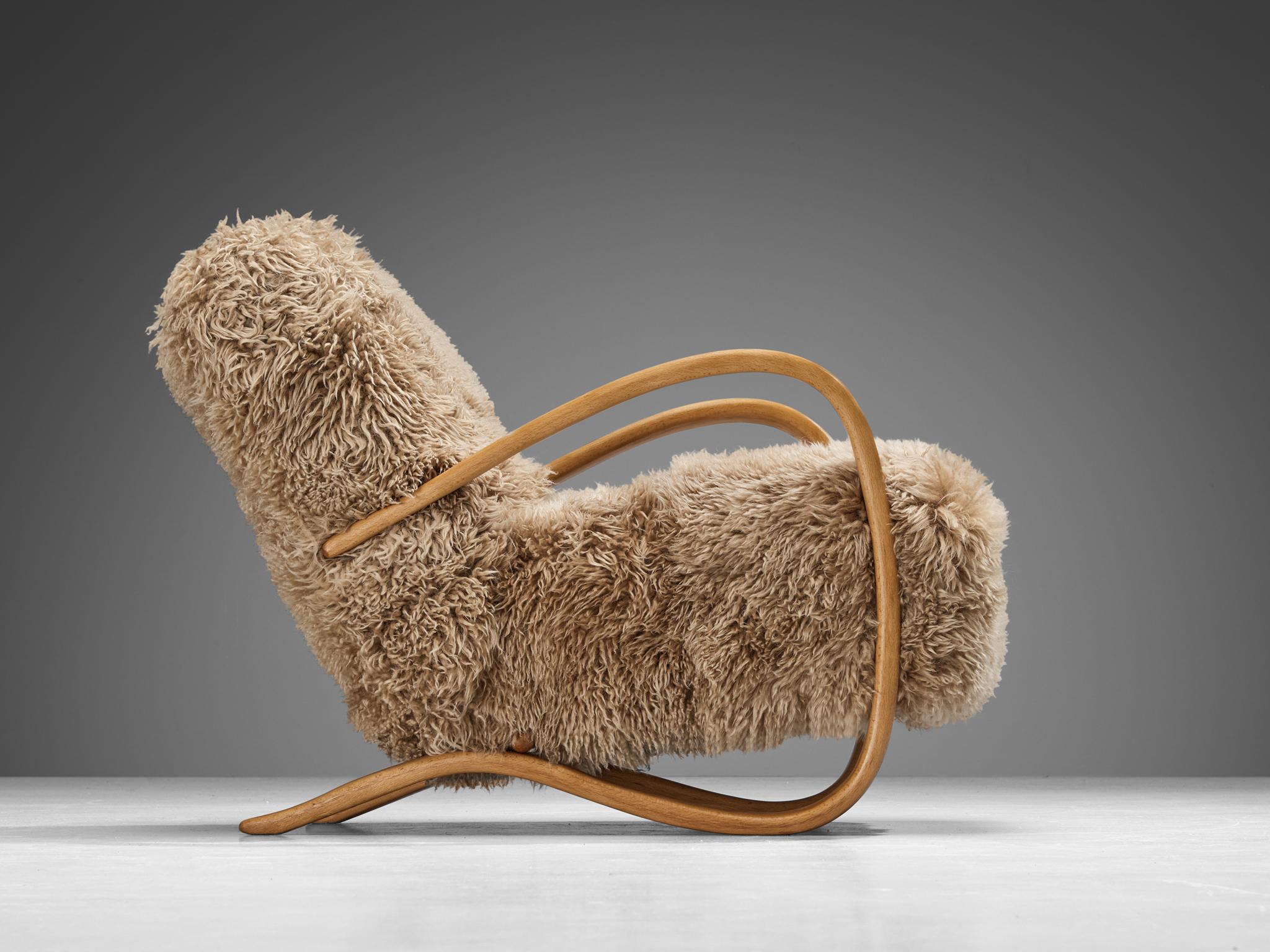 Jindrich Halabala Loungesessel aus beigem Schafsfell im Angebot 4