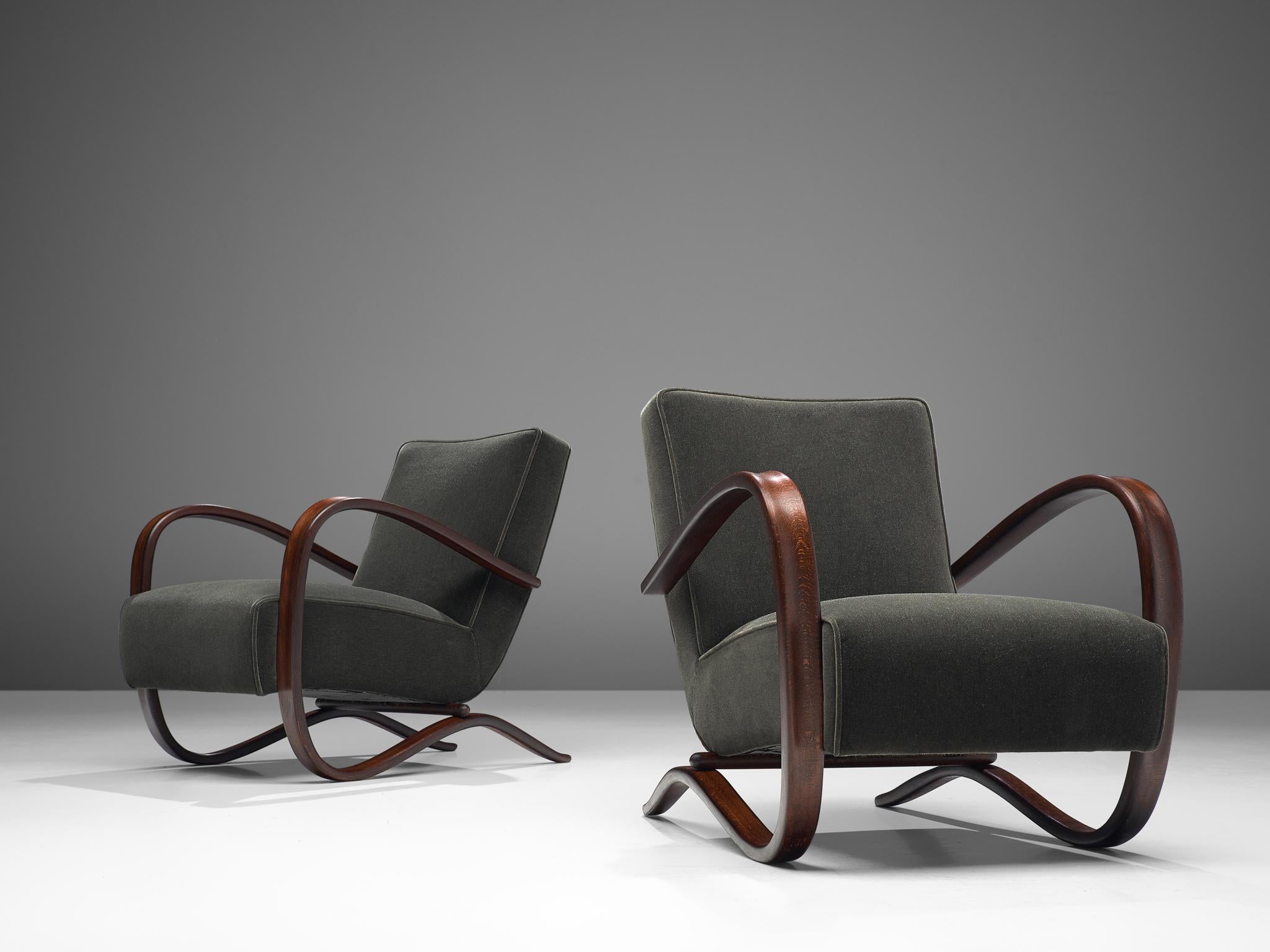 Jindrich Halabala, lounge chairs, model 'H269', stained beech, Pierre Frey Teddy Mohair Colour F2500028 Hérisson, Czech Republic, 1930s.

Extraordinary easy chairs upholstered in a fine mohair by Pierre Frey. These armchairs have a very dynamic