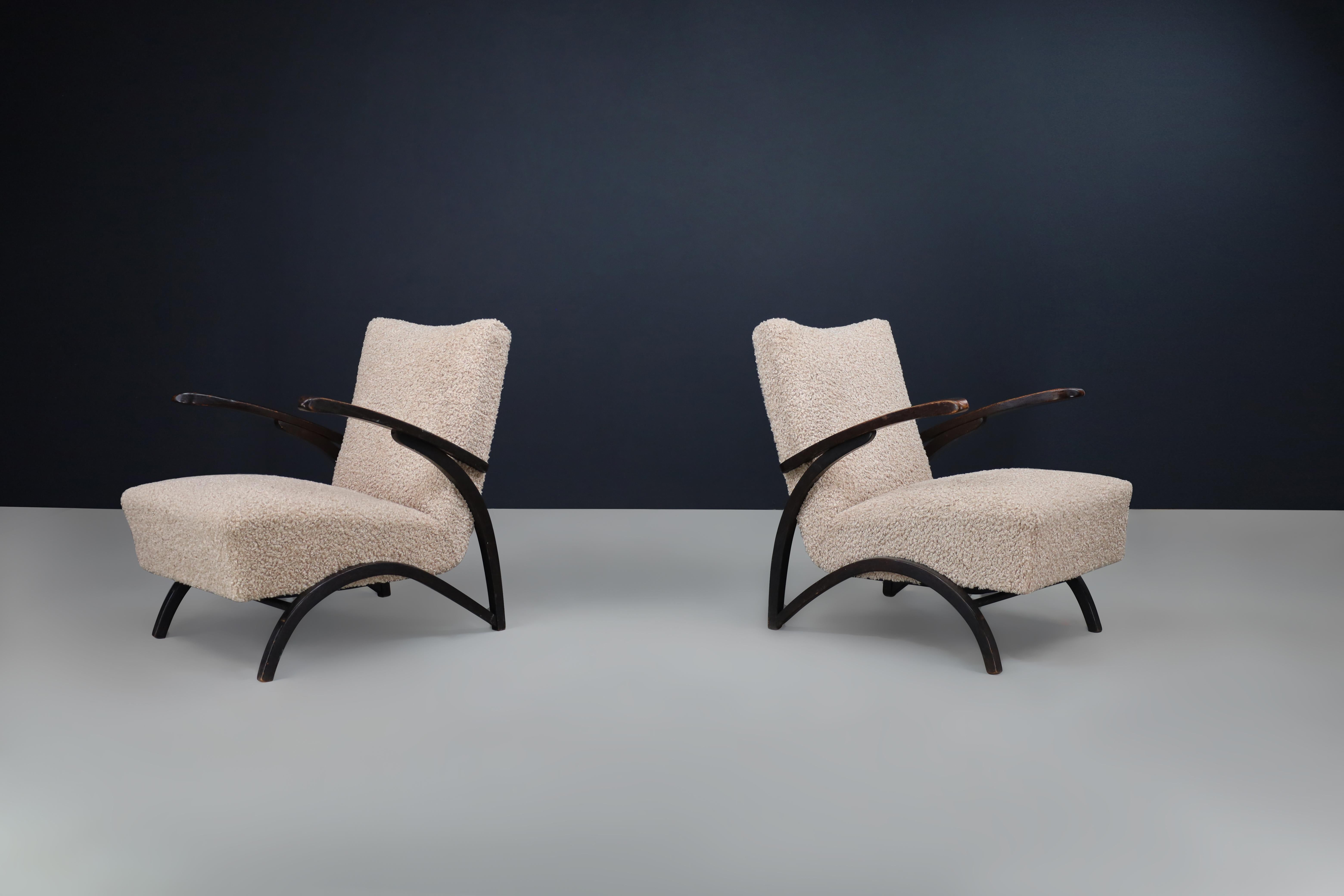 Jindrich Halabala Lounge Chairs in Teddy  Upholstery Czech Republic 1930. 

These lounge chairs were designed by Jindrich Halabala and produced by Thonet in Czechia around 1930. They are an excellent representation of midcentury design in Central