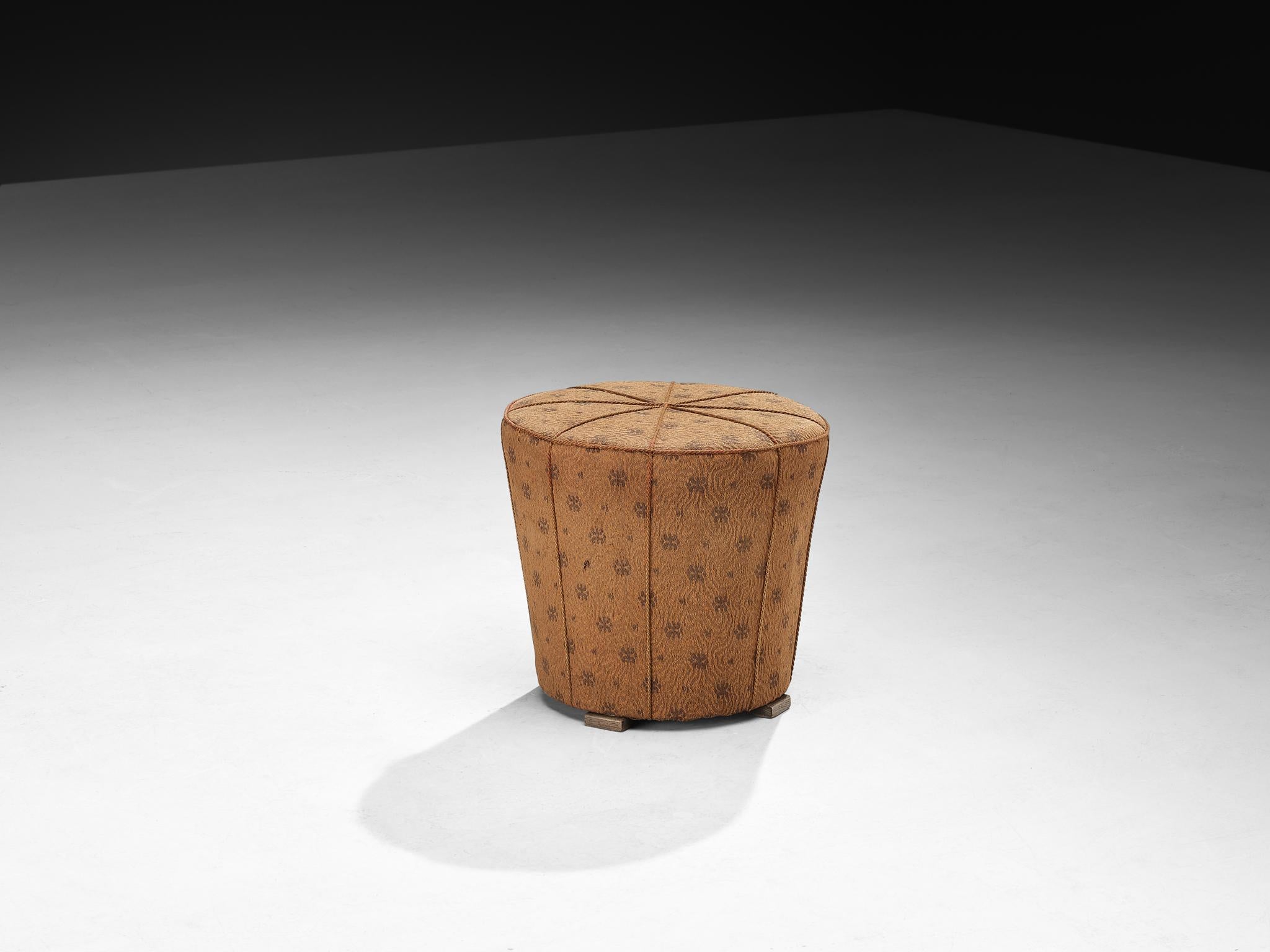 Jindrich Halabala for UP Závody, footstool, tabouret, ottoman, fabric, oak, Czech Republic, 1930s.

This poetic pouf, designed in the 1930s at the height of the Art Deco movement, stands out for its artistic upholstery, and its intriguing