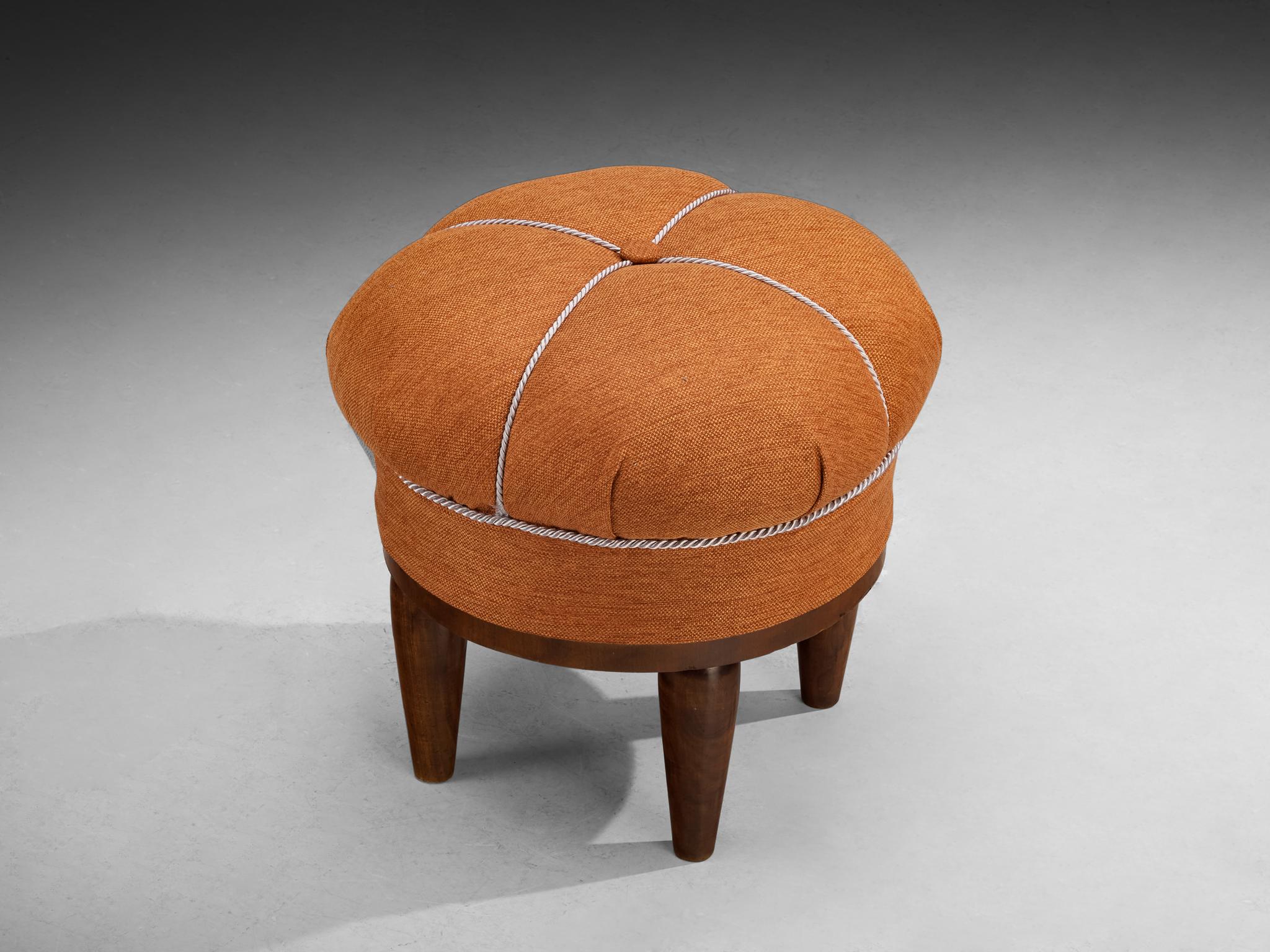 Jindrich Halabala for UP Závody, footstool, tabouret, ottoman, fabric, walnut, Czech Republic, 1930s.

This poetic pouf, designed in the 1930s at the height of the Art Deco movement, stands out for its artistic upholstery, and its intriguing