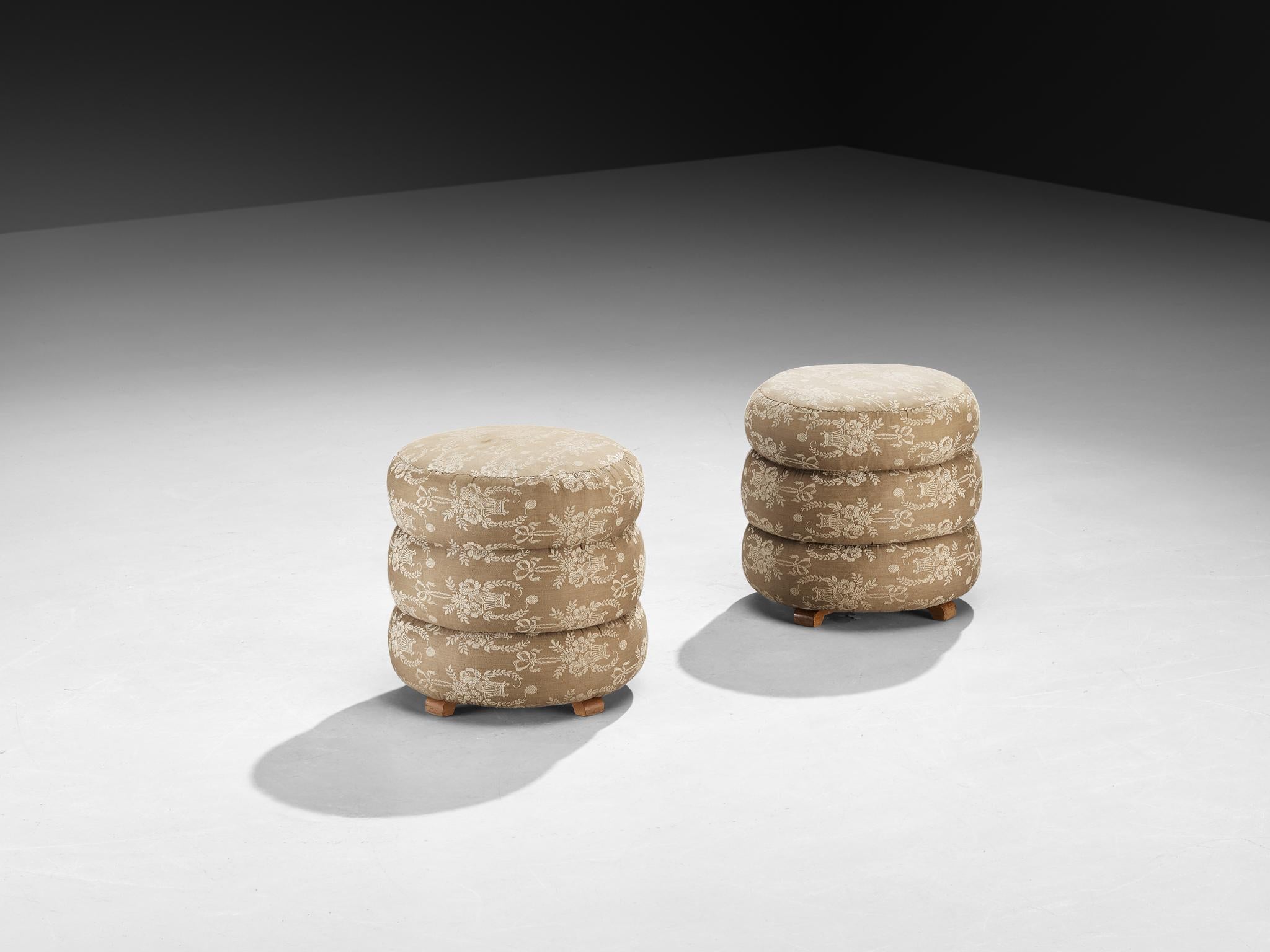 Jindrich Halabala for UP Závody, footstools, tabourets, ottomans, fabric, beech, Czech Republic, 1930s.

This poetic pouf, designed in the 1930s at the height of the Art Deco movement, stands out for its artistic upholstery, which still retains its