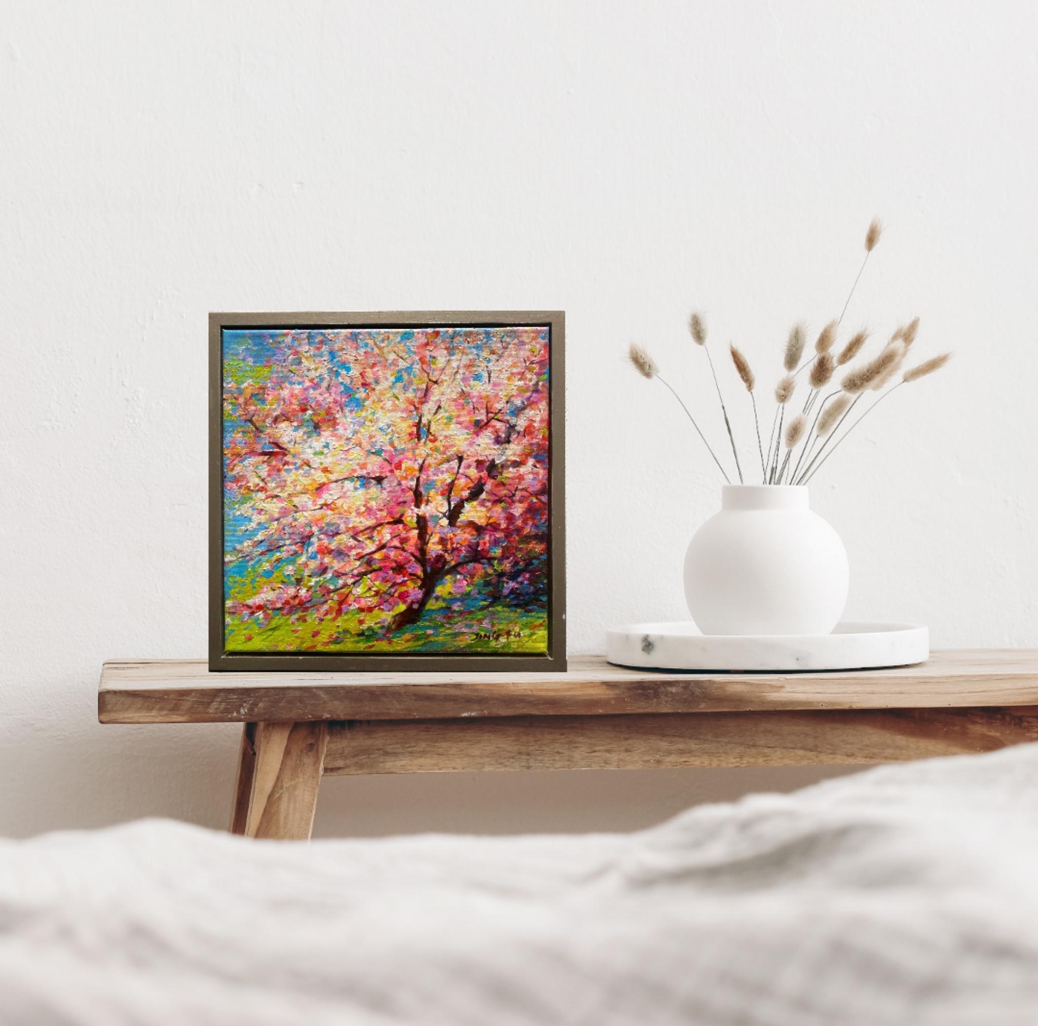 Spring on the way is a vibrant oil painting on canvas depicting a colorful blossoming tree in pink and yellow on a green lawn.
Comes framed and ready to hang.

