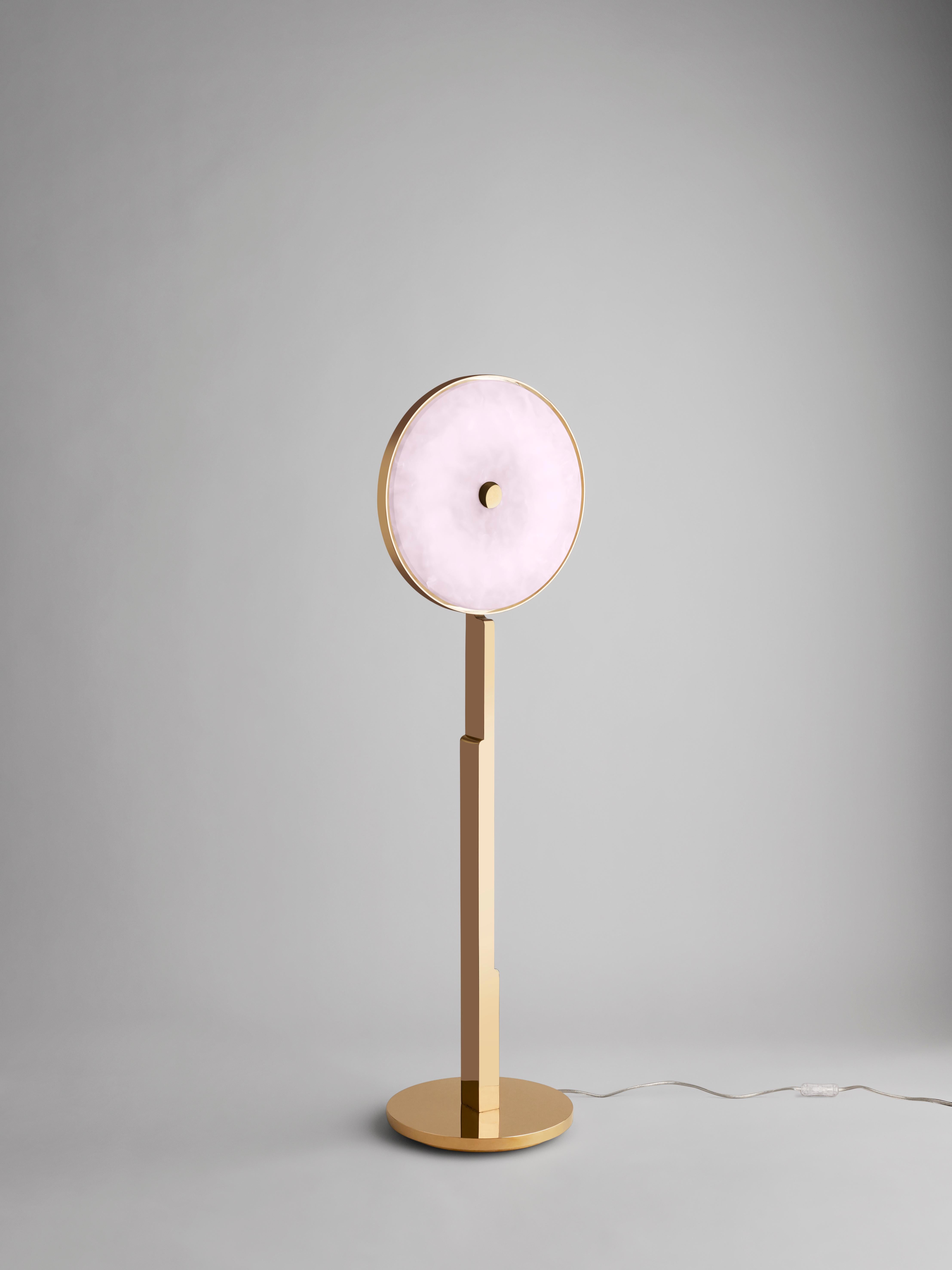 This 'JinShi Pink Jade' glamorous floor light by acclaimed design duo Studio MVW is a true jewel for the home. It encompasses a retro-lit head with a diameter of 37 cm/14.5 inches in natural pink jade, an exceptional gemstone with a sumptuous powder