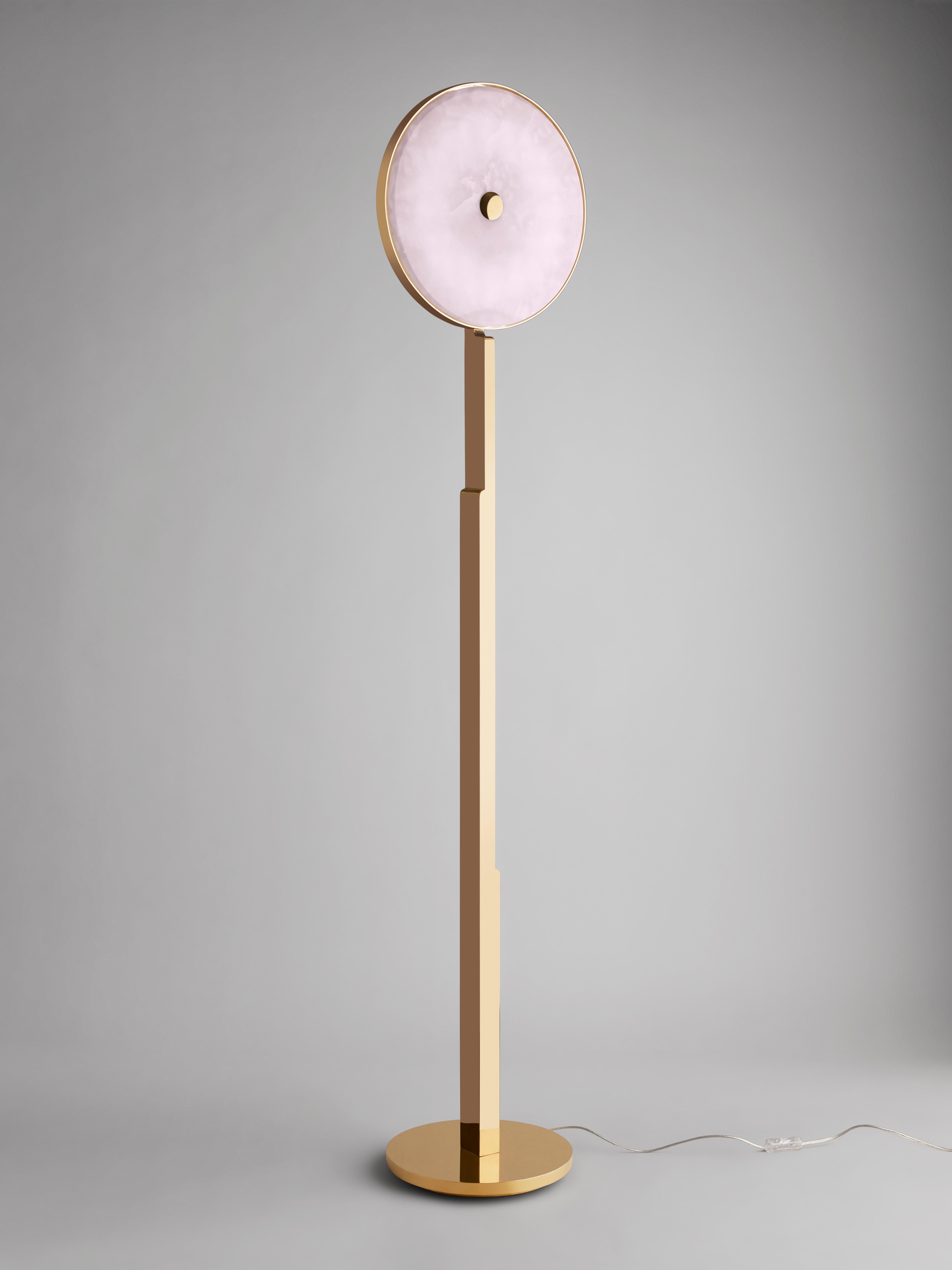 This 'JinShi Pink Jade' glamorous floor light by acclaimed design duo Studio MVW is a true jewel for the home. It encompasses a retro-lit head with a diameter of 37 cm/14.5 inches in natural pink jade, an exceptional gemstone with a sumptuous powder
