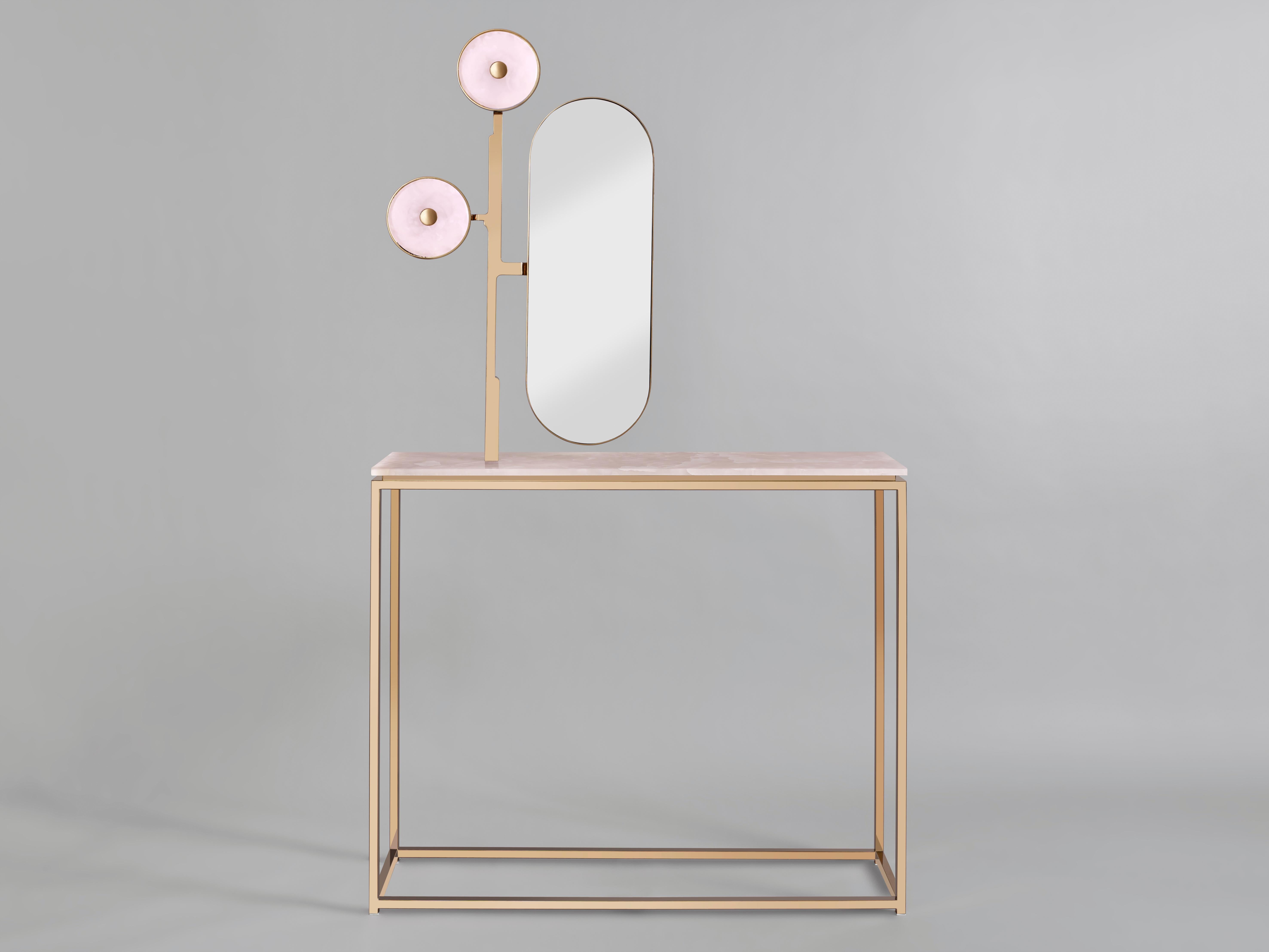This 'JinShi Pink Jade' glamorous luminous console by acclaimed design duo Studio MVW is a true jewel for the home. It encompasses a top sculpted in natural pink jade, an exceptional gemstone with a sumptuous powder transparency, a mirror as well as