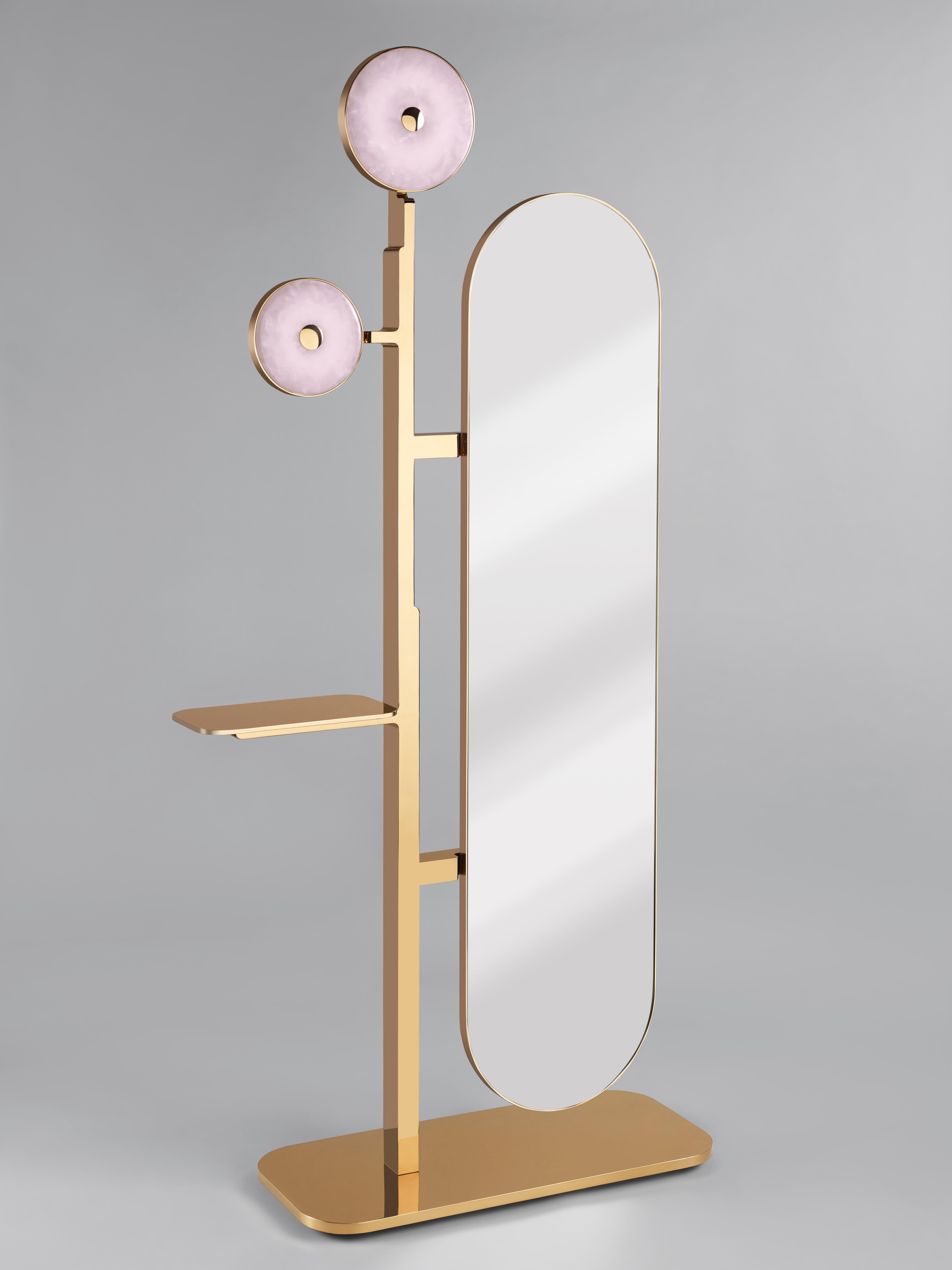 This 'JinShi Pink Jade' glamorous mirror by acclaimed design duo Studio MVW is a true jewel for the home. The mirror encompasses two retro-lit heads in natural pink jade, an exceptional gemstone with a sumptuous powder transparency, and a structure
