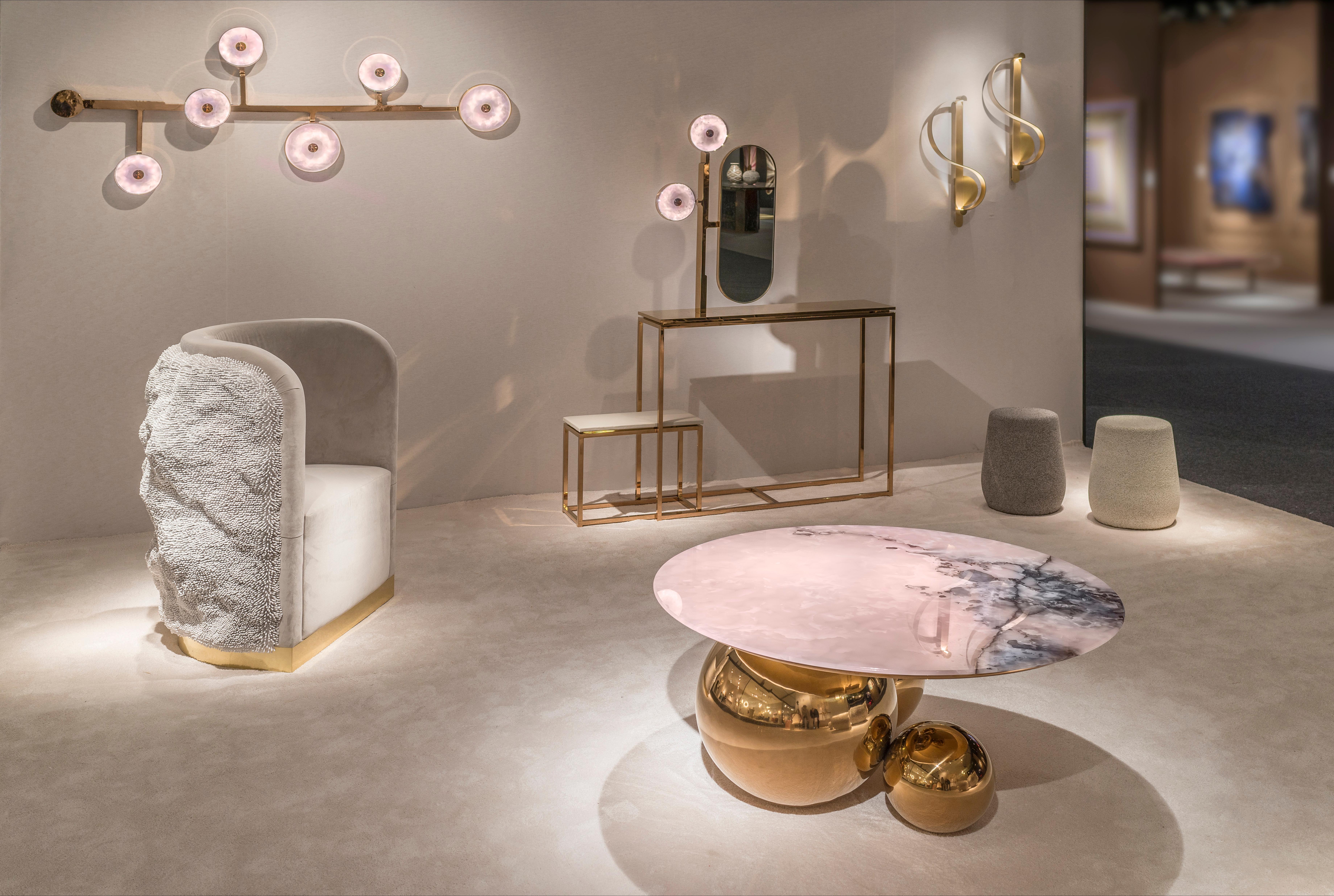 'JinShi Pink Jade Wall Light #2' by acclaimed design duo Studio MVW is an impressive 183 cm long wall lamp including six retro-lit pink jade heads. It is part of ‘JinShi Pink Jade', a precious collection of furniture and lights featuring pink jade,