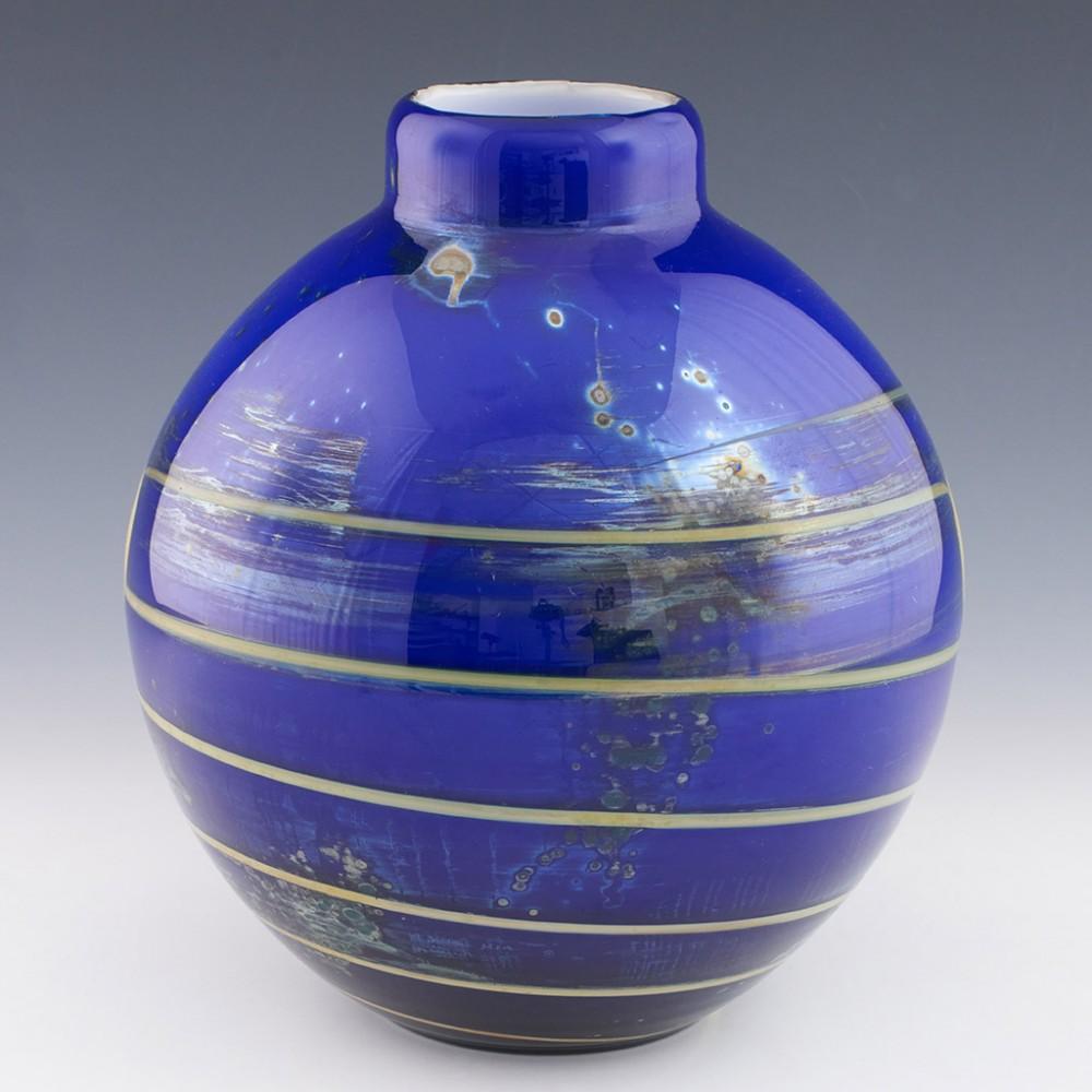 Heading : Crystalex 'Flora' range ball vase
Date : Designed 1980 by Jiri Suhajek
Origin : Novy Bor
Bowl Features : Blue glass swith lemon trailing and flecks
Type : Lead
Size : 27cm height, 23cm diameter
Condition :Excellent, no chips or