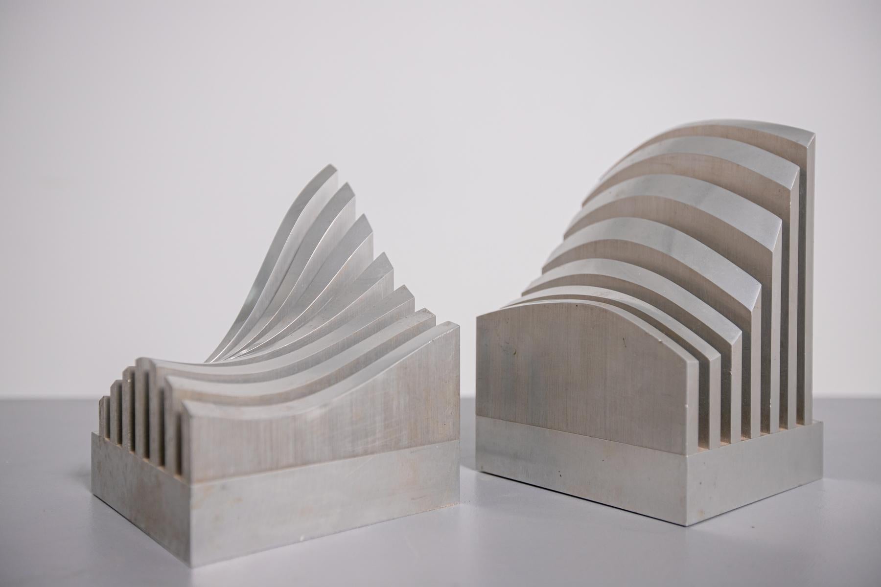 Aluminium and metal sculpture by Jiro Sugawara from the 1970s. The sculpture can be used also as a card holder, or as a book holder. The sculpture is a wave-like landscape with soft and wavy lines. The sculpture is suitable for sideboard and decor.