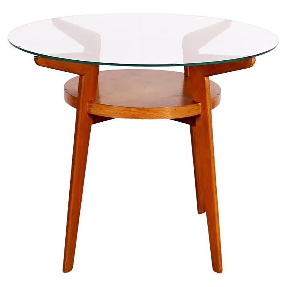 Retro Style Czechoslovakian table manufactured by Jitona in the 1960s.
The wooden elegant structure has a glass table top.
 