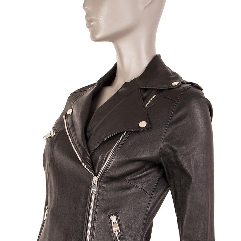 100% authentic Jitrois biker jacket in black lambskin. notch collar, epaulettes, three zipper pockets on the front, belt loops around the waist, zippered cuffs, and two zipper pleats on the back. Collar can be held open with silver-tone snaps.