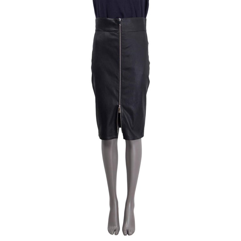 100% authentic Jitrois full-zip midi skirt in black lamb leather (100%). Opens with two zippers on the front. Lined in black cotton (97%) and elastane (3%). Has been worn and is in excellent condition. 

Measurements
Tag Size	42
Size	M
Waist