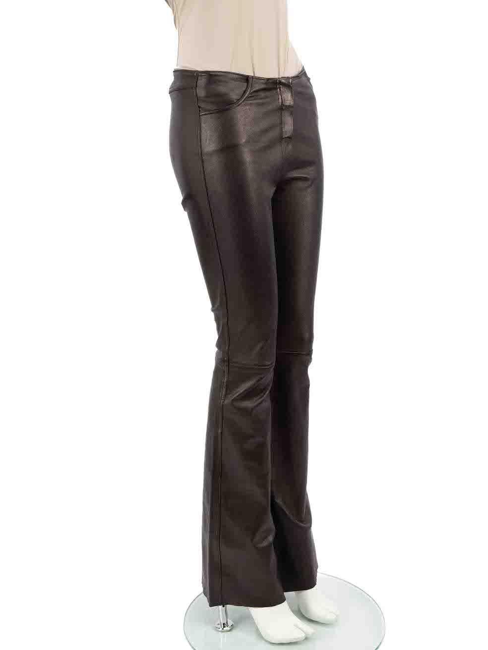 CONDITION is Very good. Minimal wear to trousers is evident. small scratches to the coating near the hem and waistband on this used Jitrois designer resale item.
 
 
 
 Details
 
 
 Black
 
 Leather
 
 Flared trousers
 
 Mid rise
 
 Regular length
