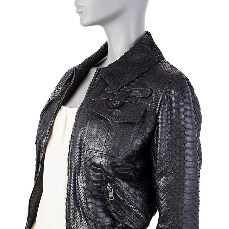 100% authentic JItrois bomber jacket in black snakeskin with flat collar, welt chest pocket, two flap pockets, two zipper pockets on the front, and ribbed waist and cuffs. Closes with brass zipper on the front. Lined in black acetate (100%). Has