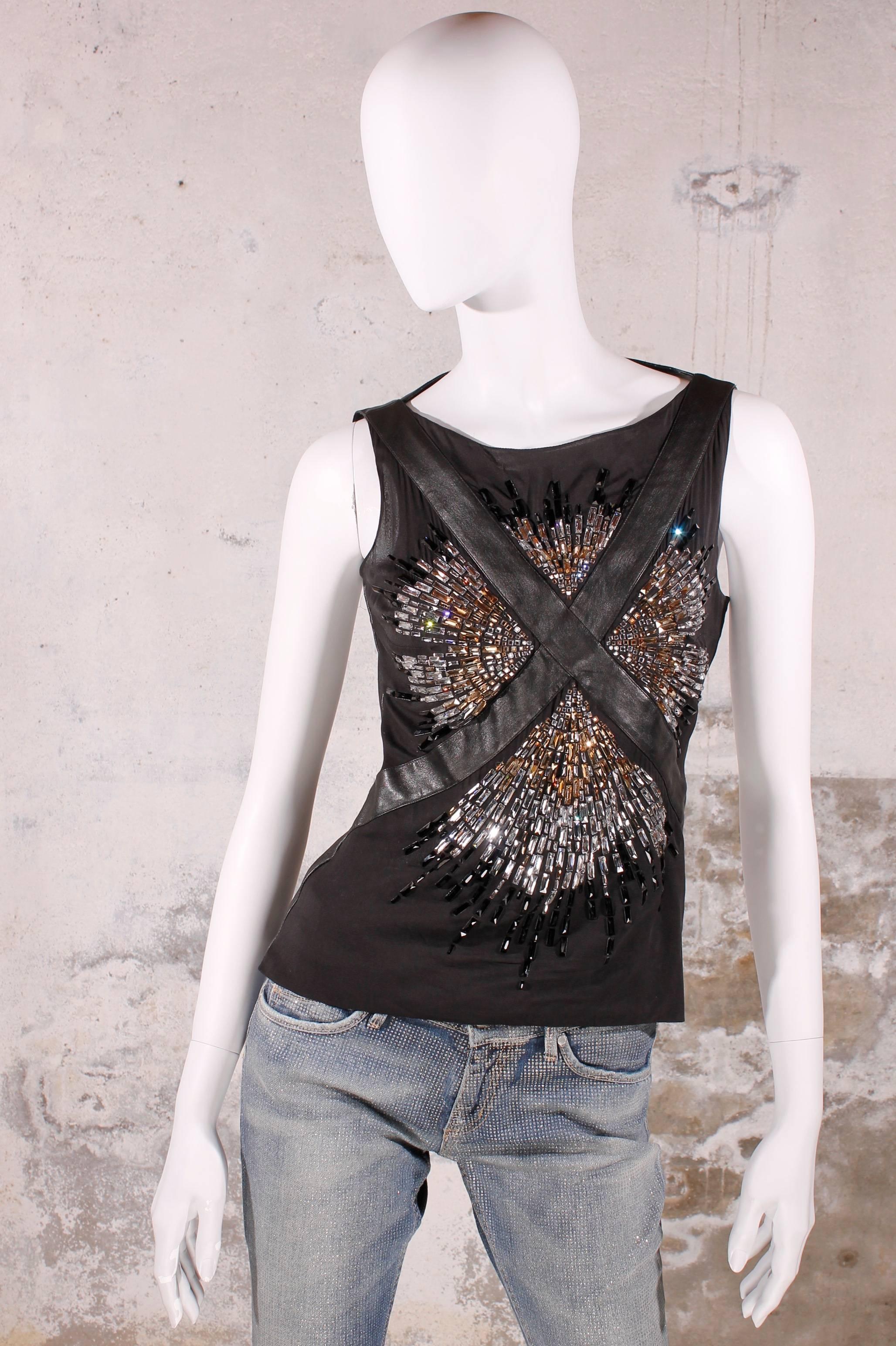 Gorgeous Jitrois couture Tank Top in black leather and black silk embroided with  rectangular Swarovski rhinestones in black and white.
A leather strap crosses the bust, from the shoulder to the waist. Rest of the front is made of black silk. 
The