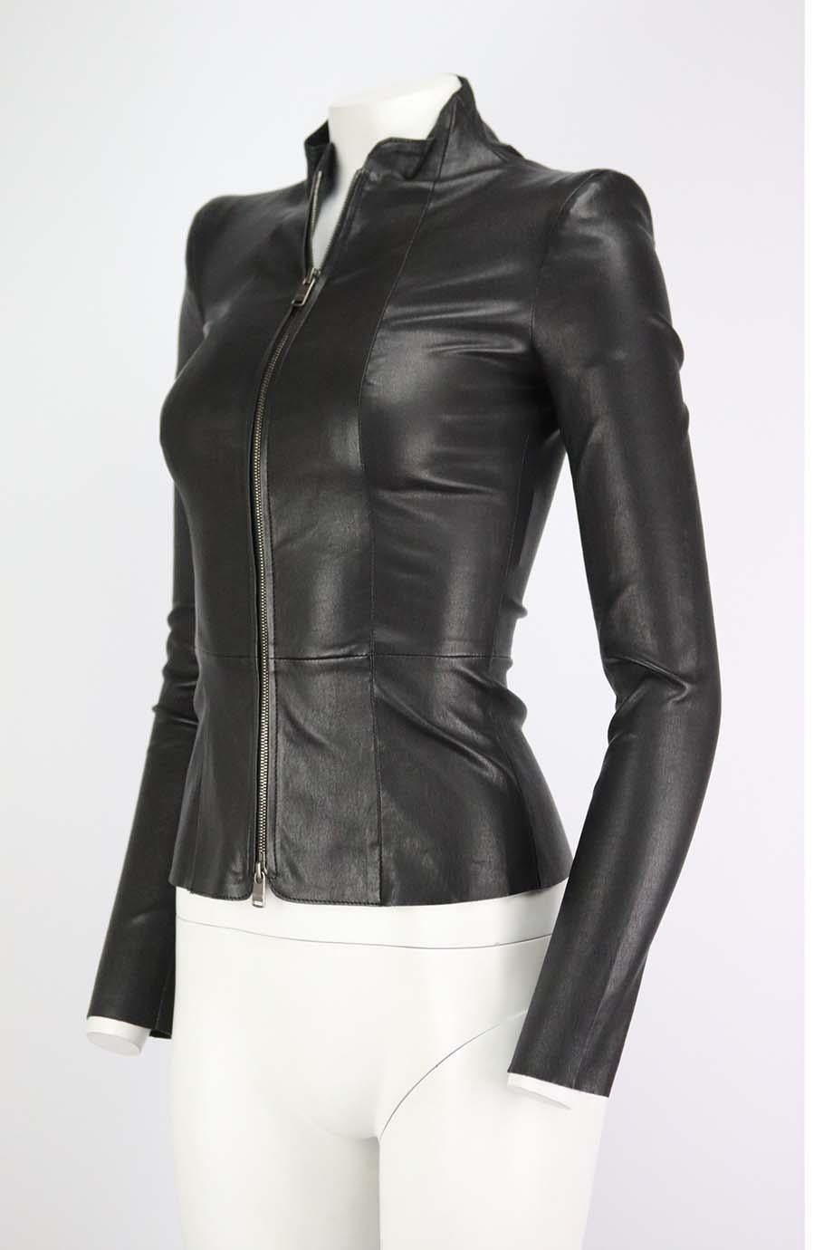 This jacket by Jitrois is crafted from butter-soft leather, it is tailored in a slim, waist-defining shape. Black leather. Zip fastening at front. 100% Lambskin. Size: FR 34 (UK 6, US 2, IT 38). Shoulder to shoulder measures approx. 15 inches. Bust