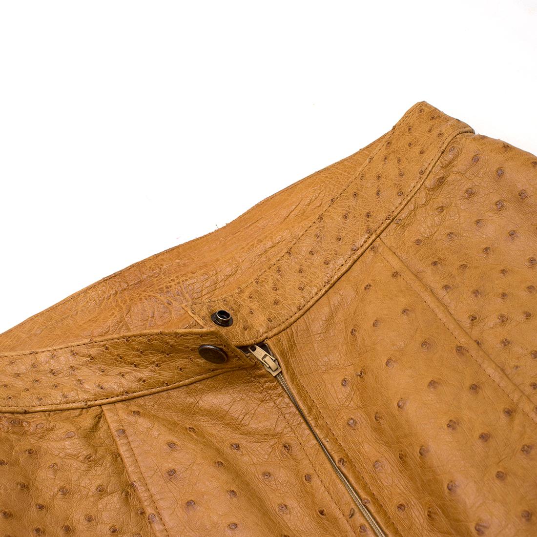 Jean Claude Jitrois Tan Ostrich Leather Skirt

-Midi pencil skirt
-Slit at the back
-Tailored at the waist
-Zip and popper closure

-There is a matching jacket available

Please note, these items are pre-owned and may show signs of being stored even