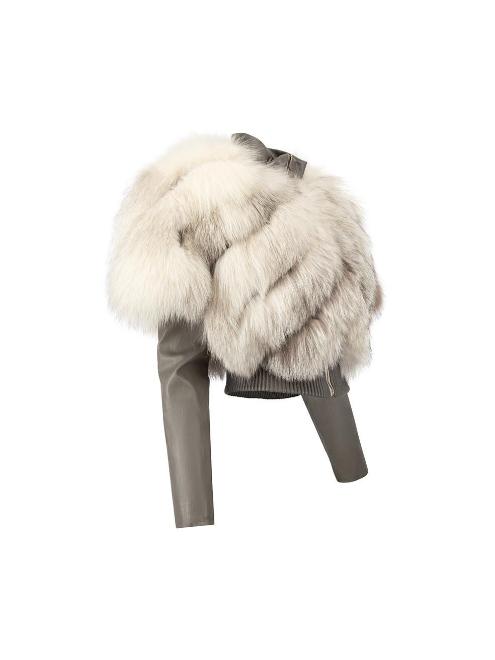 CONDITION is Very good. Minimal wear to jacket is evident. There are stains that can be seen on the exterior leather material on the left cuff on this used Jitrois designer resale item. 
 
 Details
  Grey
 Fur and leather
 Fitted cropped jacket
