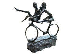 Fietsspel Play Bike Bronze Sculpture Sport Fun En stock