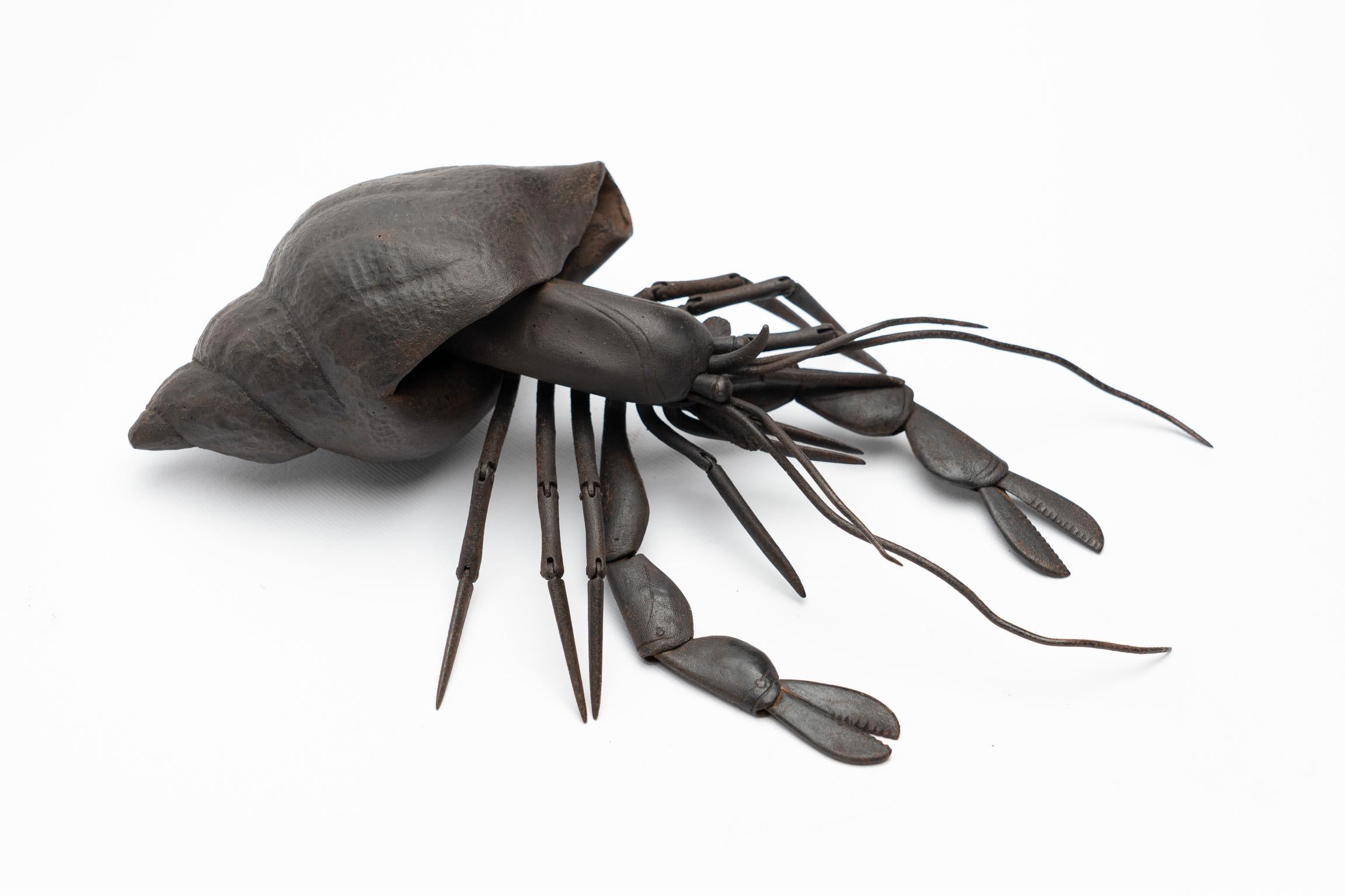 Iron Jizai Okimono A russet-iron articulated figure of a hermit crab