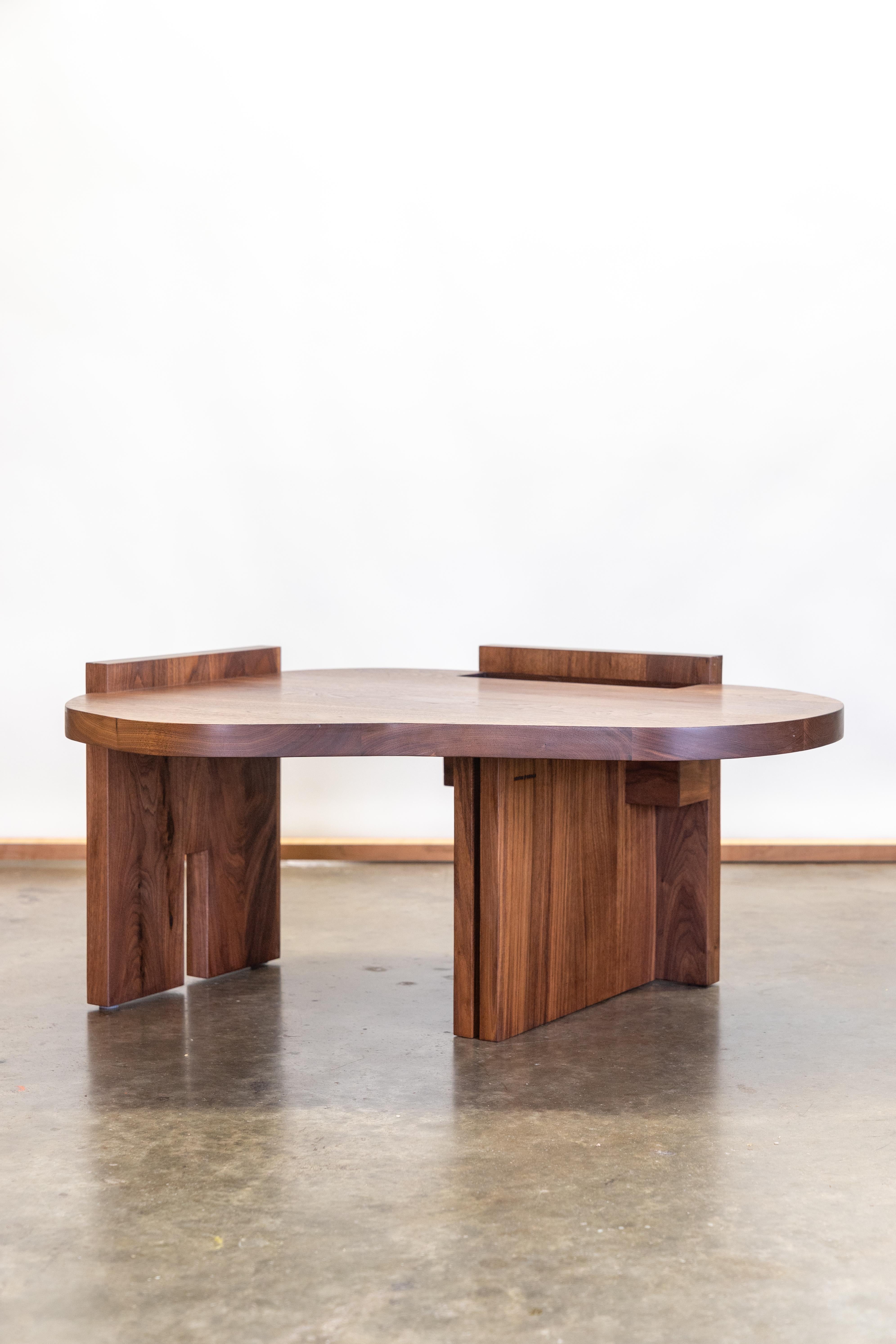 The JJ Coffee Table is a meeting between organic curves and clean geometry. Its form contrasts natural, flowing lines with the simple shapes we use to bring structure to the world. The result is a piece that feels both intuitive and deliberate—soft