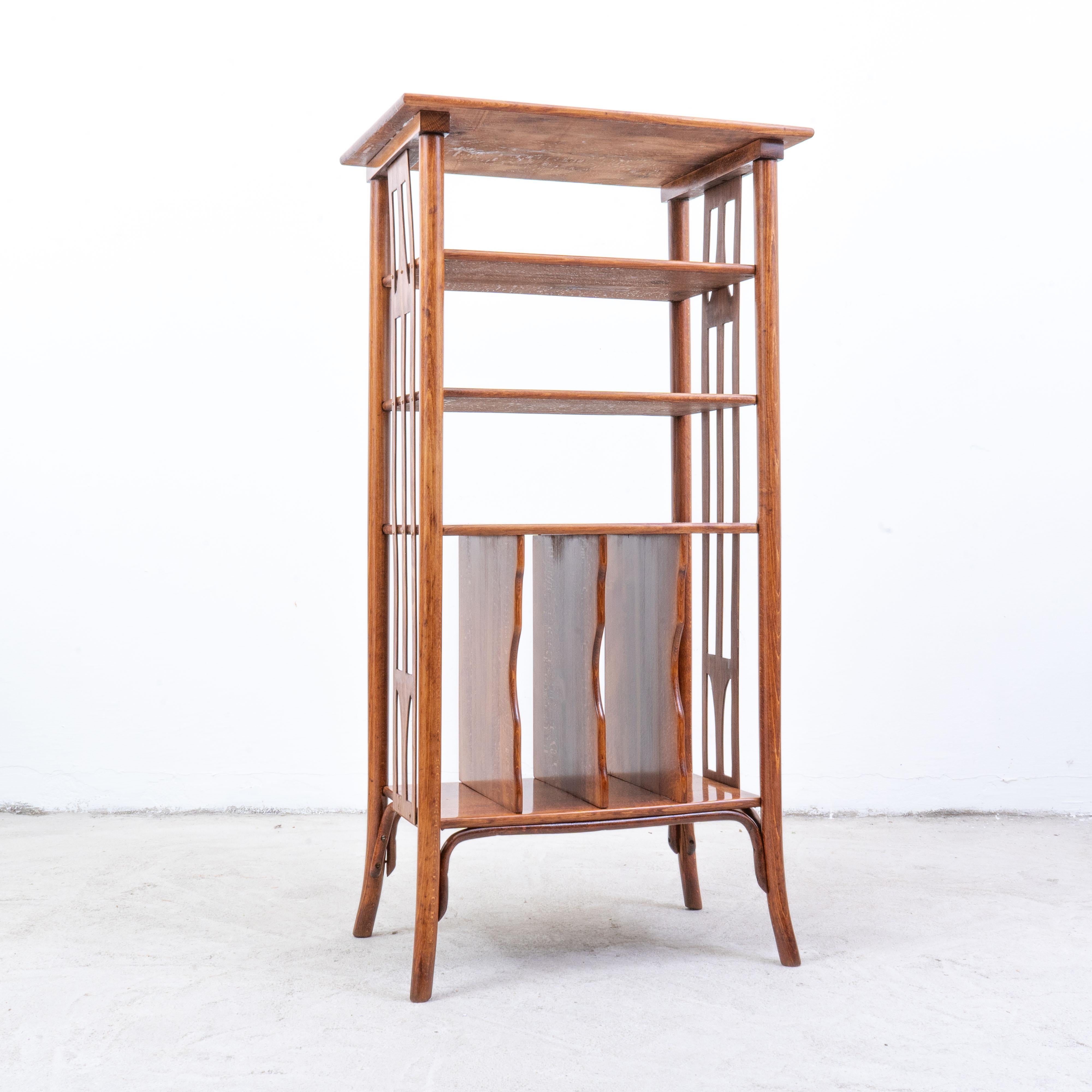 This exquisite J & J Kohn music stand, designed by the renowned Koloman Moser in the early 1900s, is a quintessential example of Jugendstil artistry. Standing at 120 cm in height, 60 cm in width, and 35 cm in depth, it embodies the movement’s