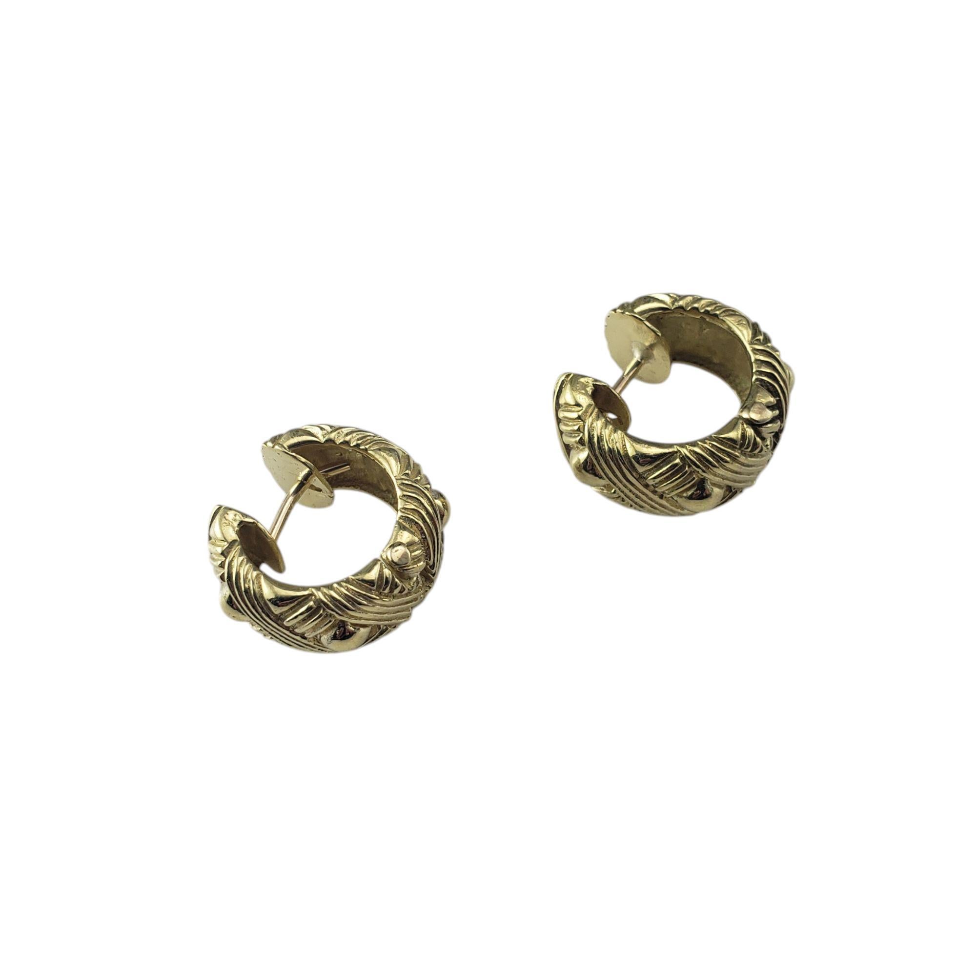 J.J. Marco 18K Yellow Gold Huggie Hoop Earrings-

These elegant huggie hoop earrings are crafted in meticulously detailed 18K yellow gold. Hinged closures. 

Width: 7.5 mm

Size: 15 mm

Weight: 7.6 dwt./11.8 gr.

Hallmark: JJ MARCO 18K

Very good