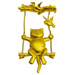 JJ signed Vintage matte gold cat on swing designer brooch