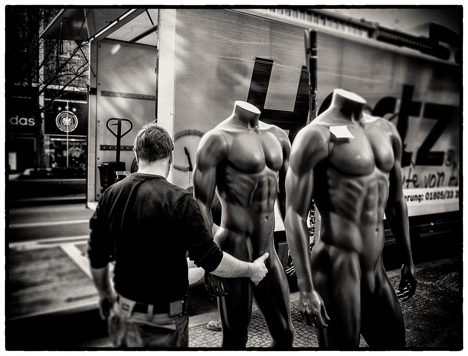 Edition of 25
signed and numbered by the artist

An employee of a transportation company is unloading mannequins and grabs a mannequin's crotch.

JJK is a pseudonym for one of the world's most successful photo artists.
In his series "Always in my