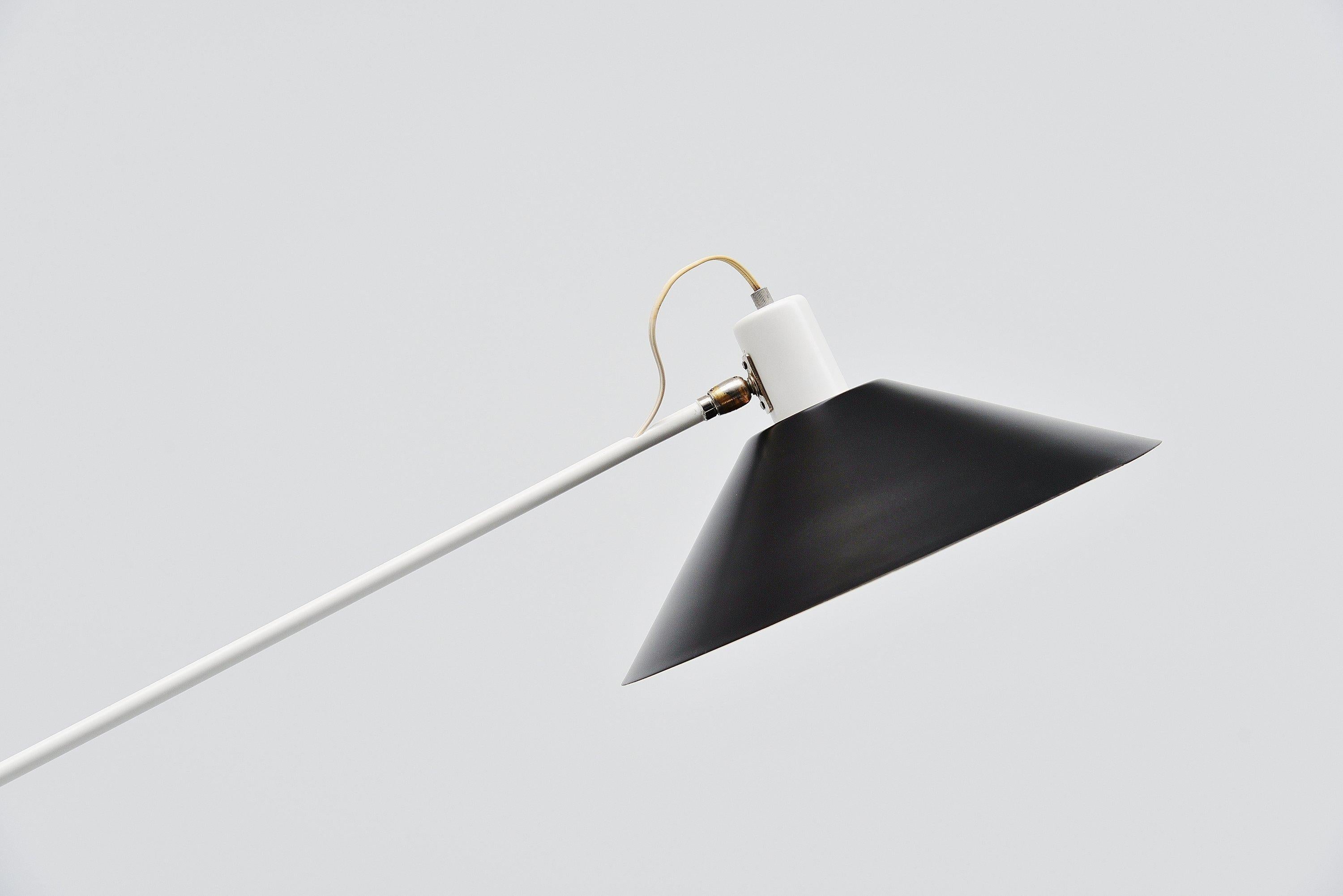 Large counter balance ceiling lamp model 5018 designed by JJM Hoogervorst and manufactured by Anvia Almelo, Holland, 1957. This counter balance lamp is usable in different positions as it is fully adjustable and can also be rotated. This typical