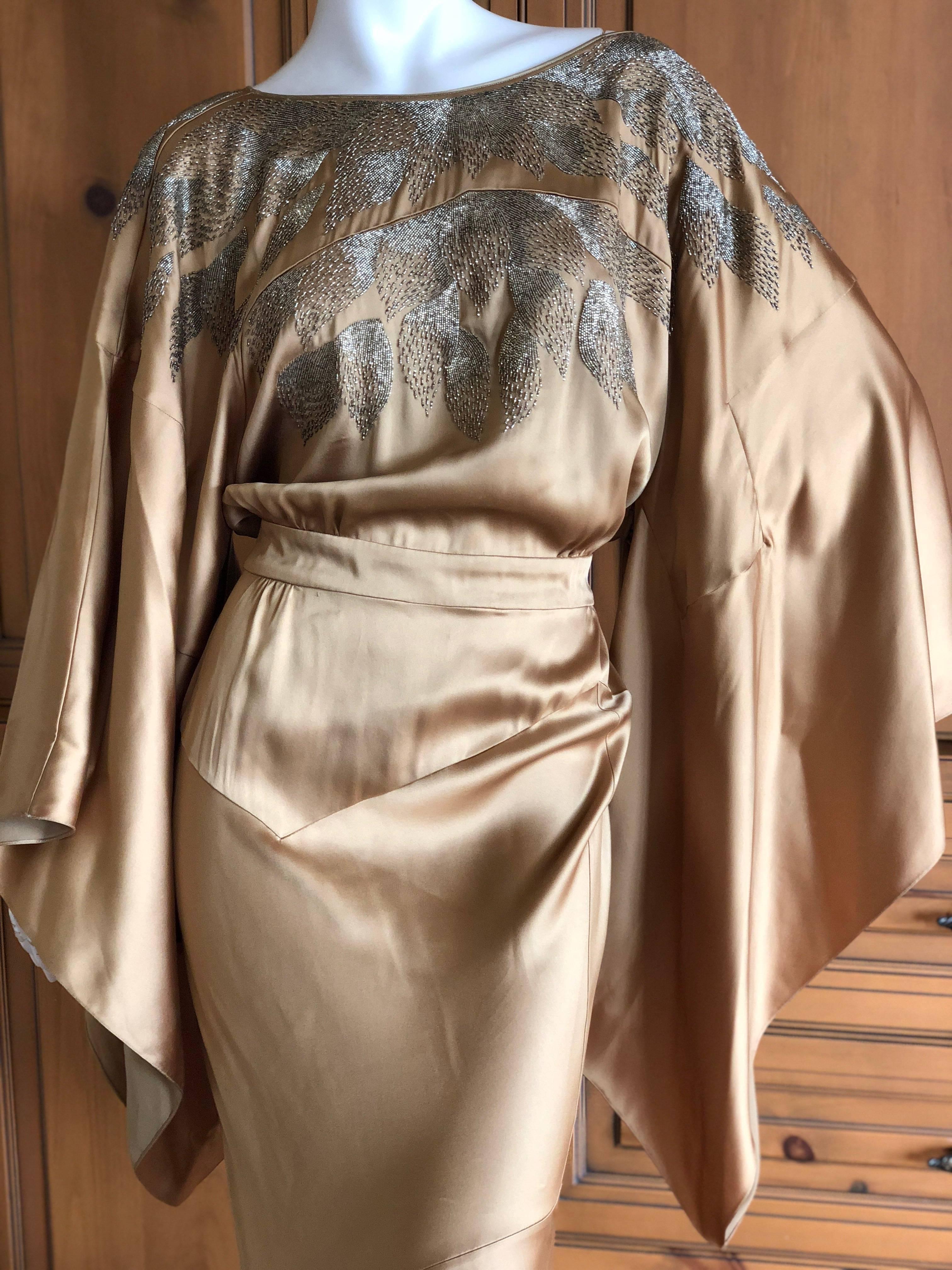 JJohn Galliano Dramatic Gold Kimono Sleeve Extravagantly Beaded Evening Dress 
This is so beautiful, please see all the photos.
Dramatic kimono sleeves and a low vee in the back, just stunning.
 Size46
Bust 44