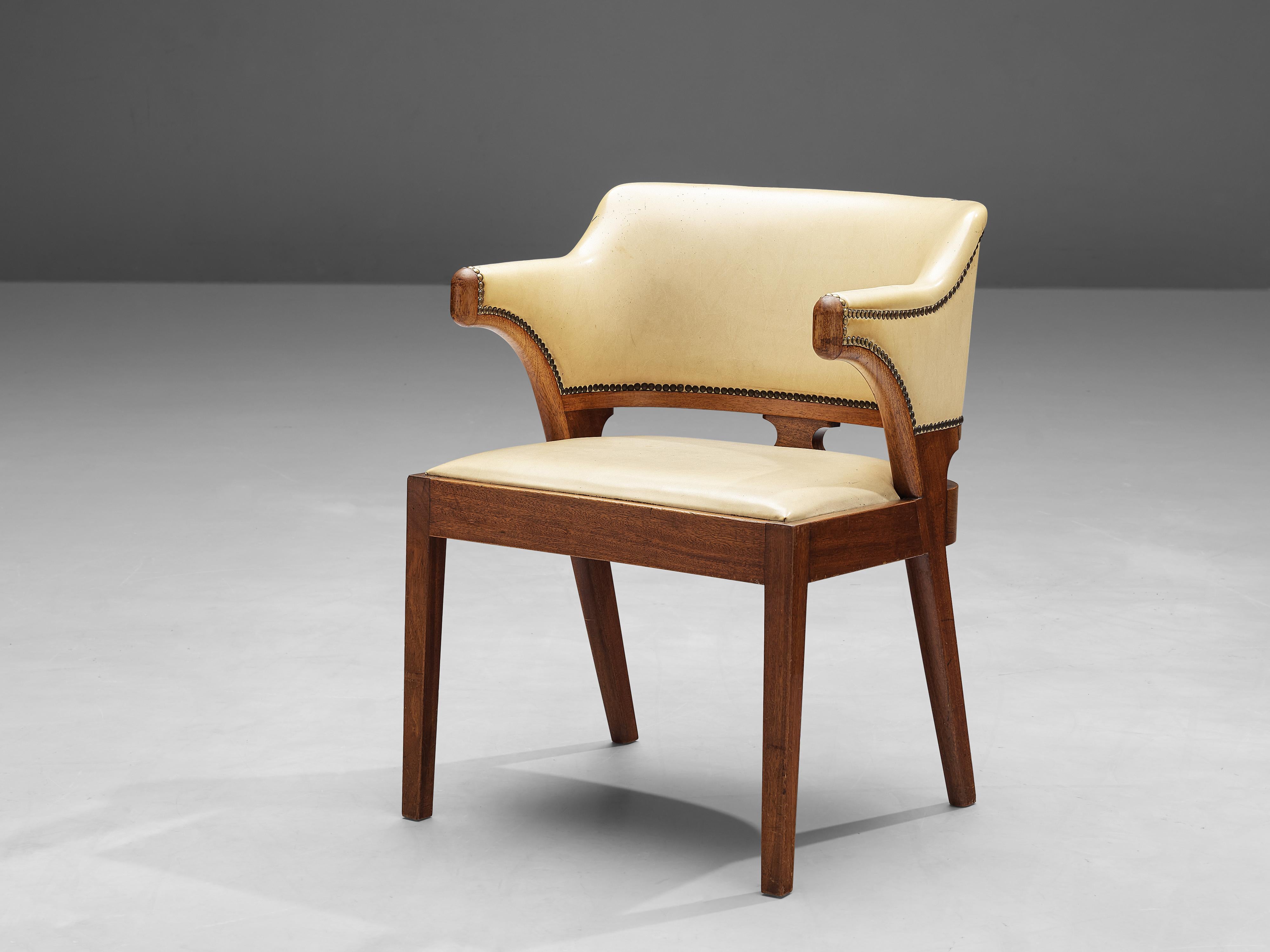 J.J.P. Oud for C.H. Eckhart, chair, mahogany, leather, brass, The Netherlands, 1930s

Elegant Dutch chair with cream leather designed by J.J.P. Oud for C.H. Eckhart. The chair has a sculptural quality which is created by the armrests that have a