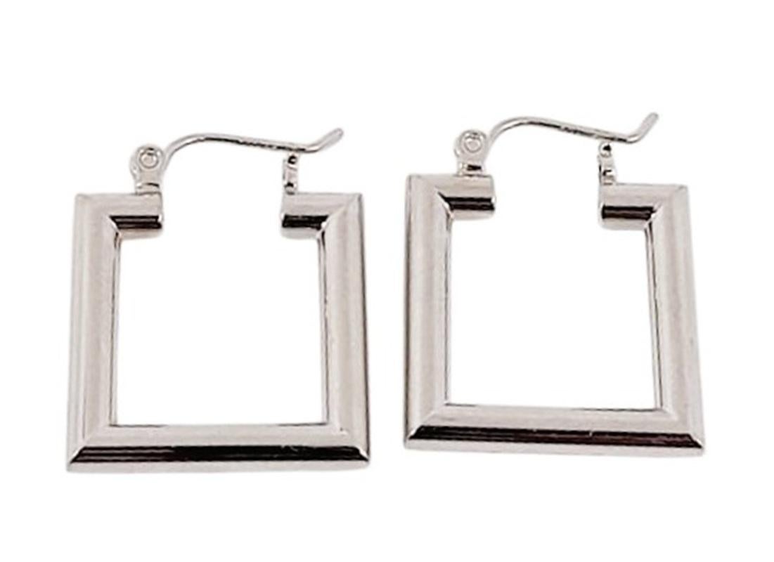 I love the design of these earrings.  They are really fun and are just a quality made pair of earrings.  They are preowned and have some light surface scratches but are otherwise in excellent condition.  They have a latch closing and the wires are