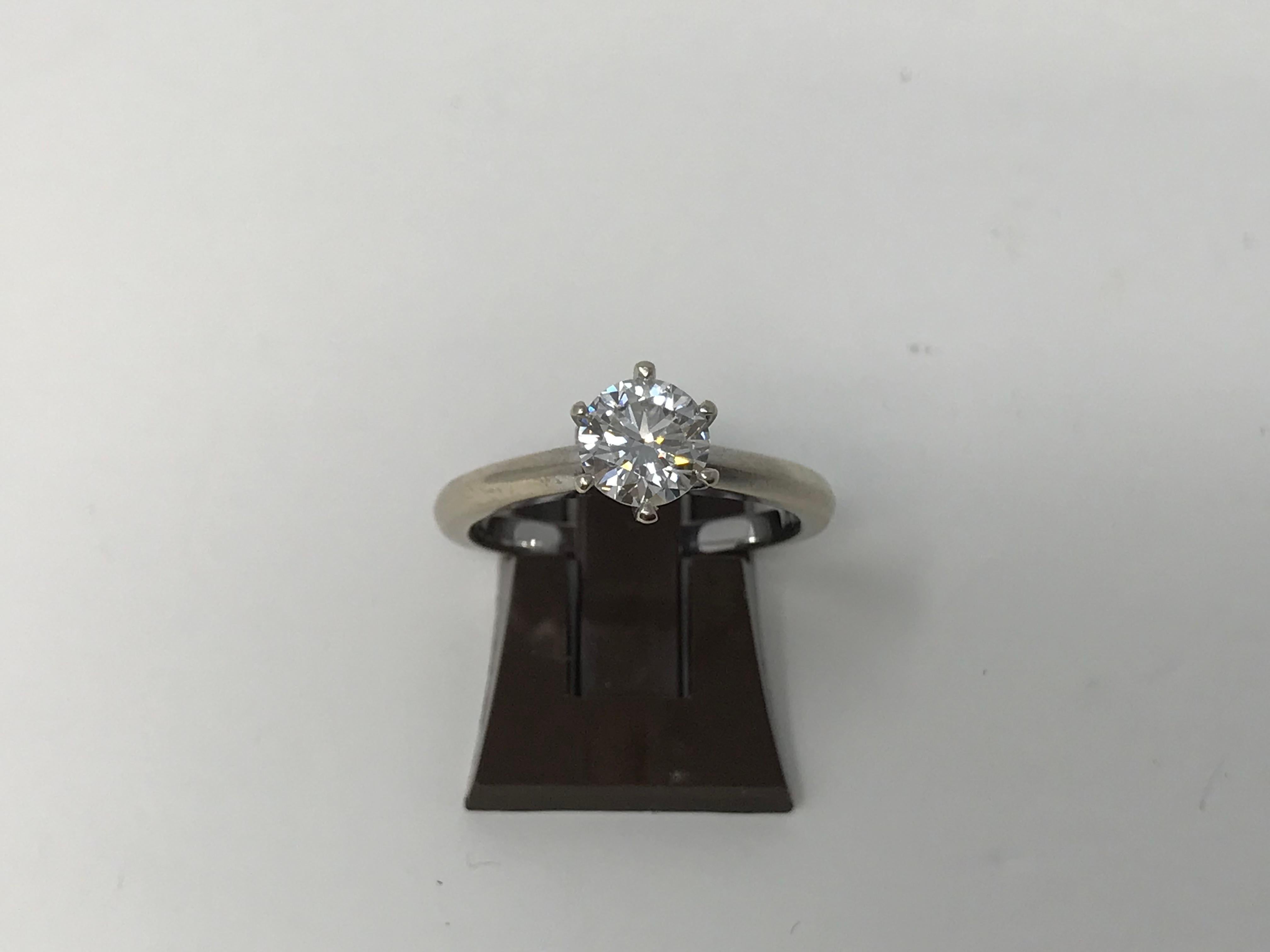 JLJ 14k white gold (stamped) engagement ring with 1ct certified diamond. Jenni Lauren jewelry engagement ring. IGI certificate 7019584U and CGQ certificate 1905247.01 are available. Solitaire style, polished and rhodium finish. The ring is set with