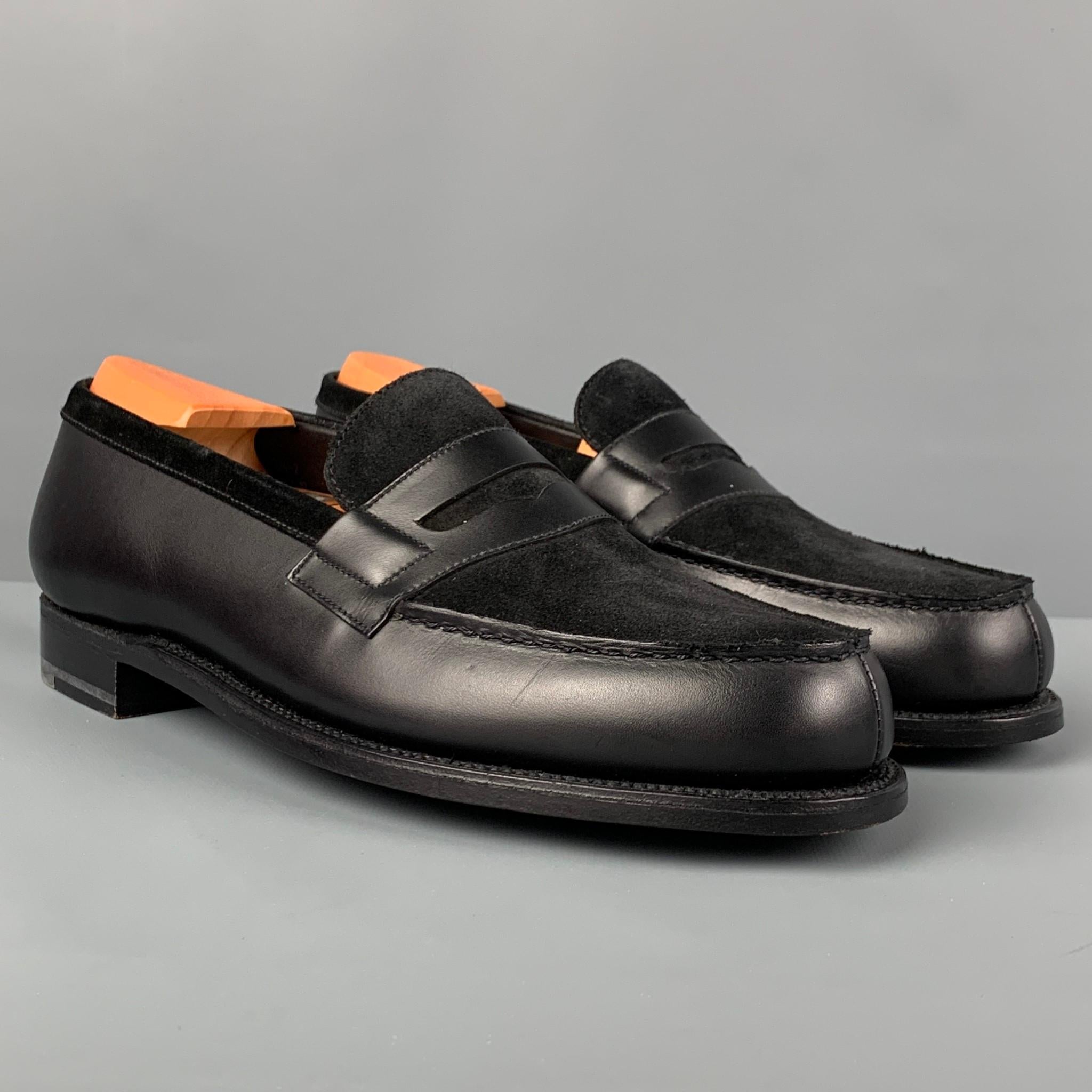 J.M. WESTON loafers comes in a black leather featuring a suede trim and a penny strap. Comes with shoe trees. 

Excellent Pre-Owned Condition.
Marked: 6 C

Outsole: 10.5 in. x 3.75 in. 